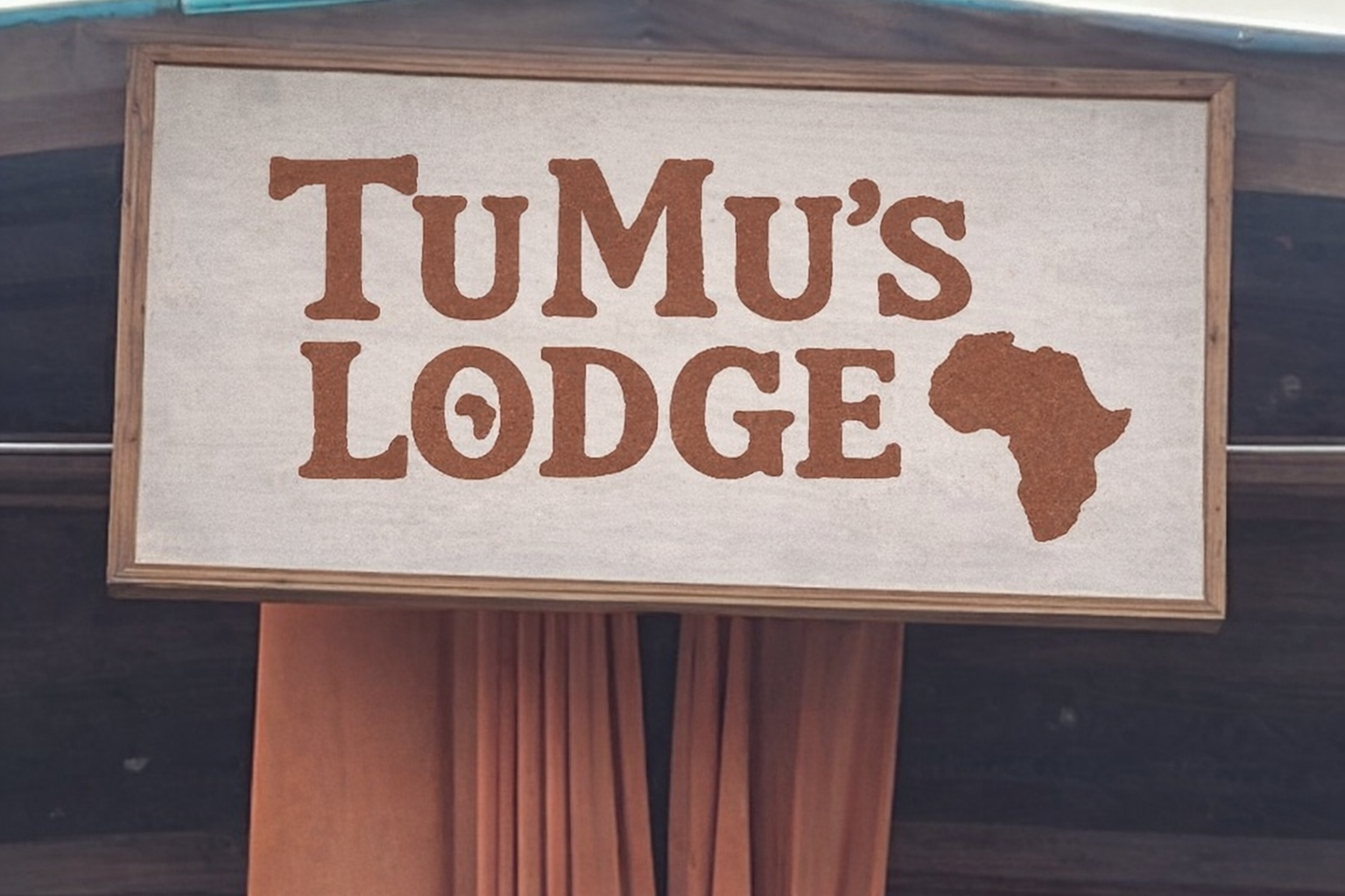TuMu's Lodge signage after redesign