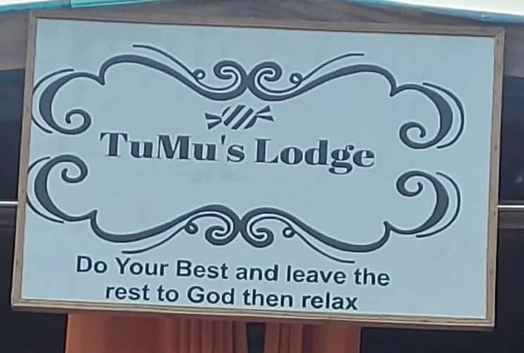Original TuMu's Lodge signage