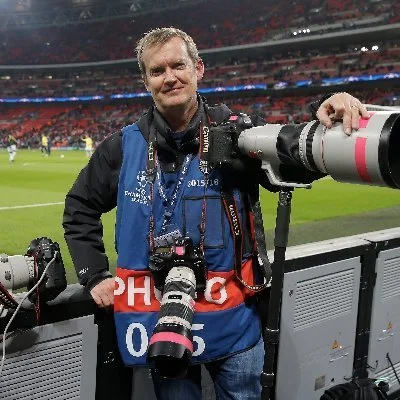 Portrait of famous sport photographer Tom Jenkins