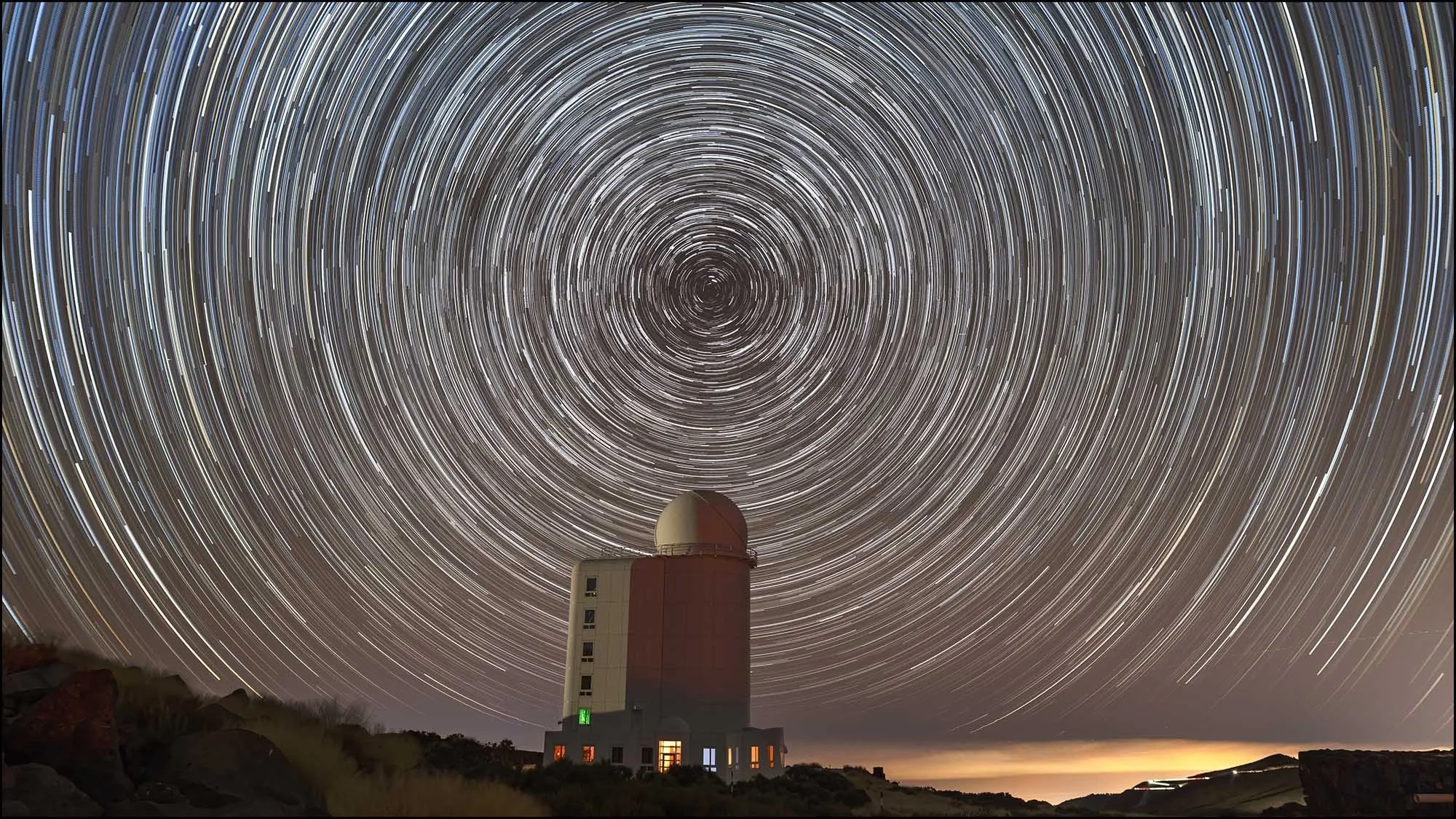 Star trail over observatory