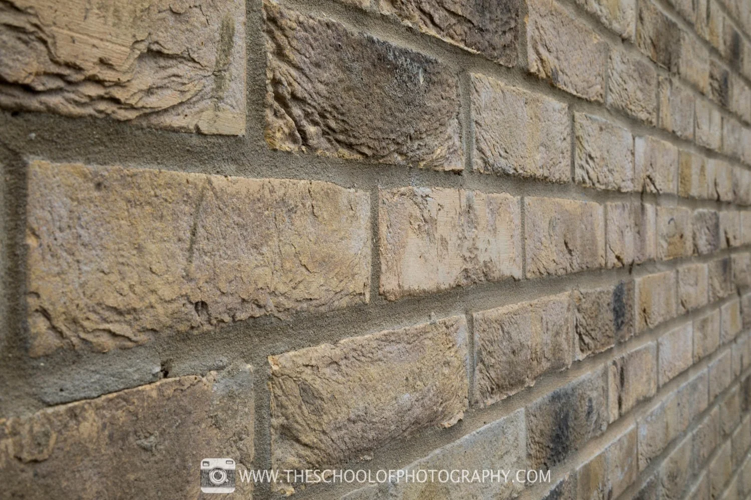 An example image of a brick wall, with a f/11 aperture setting showing wide depth of field