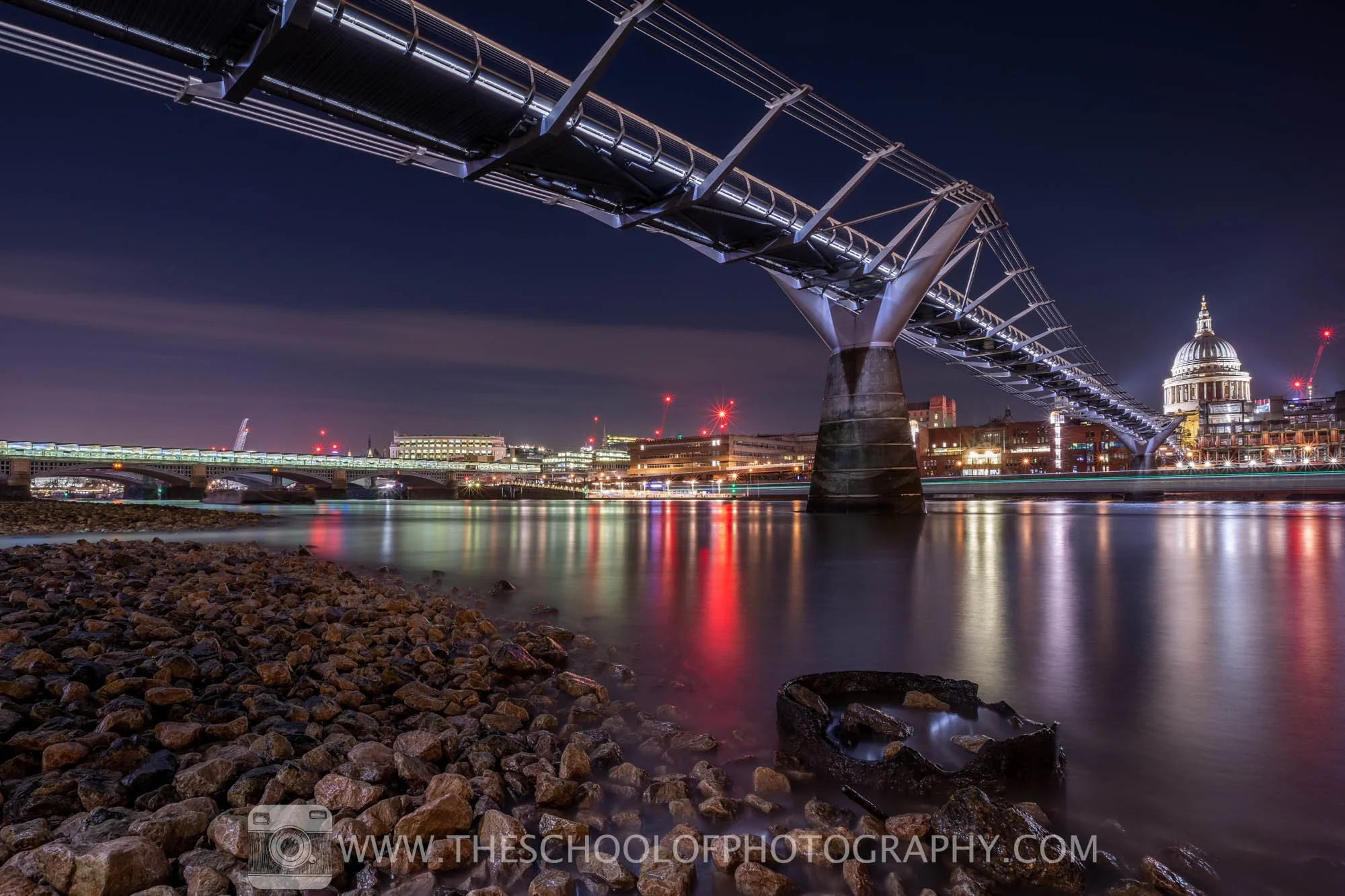 nighttime city shot under bridge using exposure bracketing and hdr merge