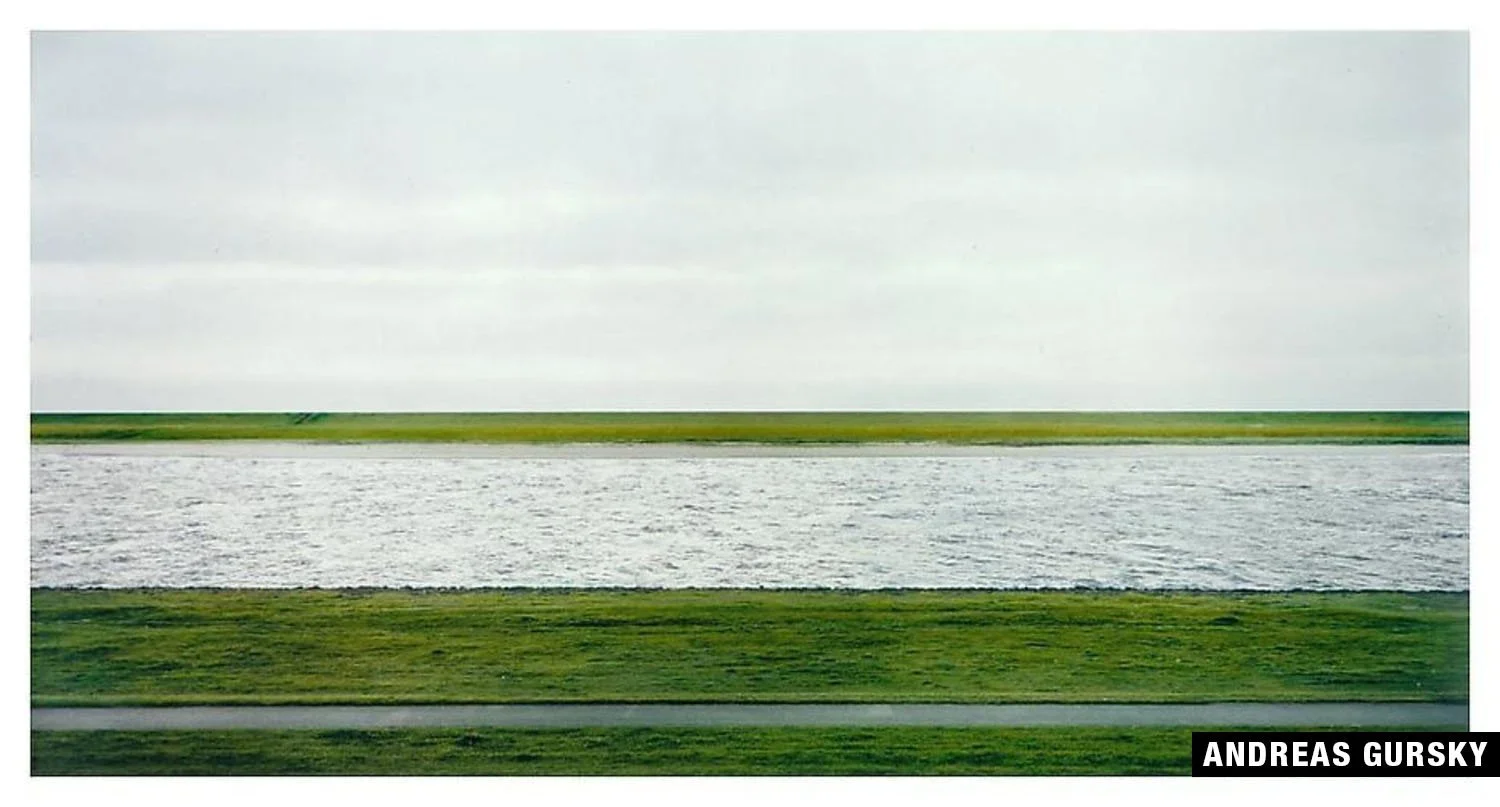 Rhein II by Andreas Gursky: River, green banks, and sky.