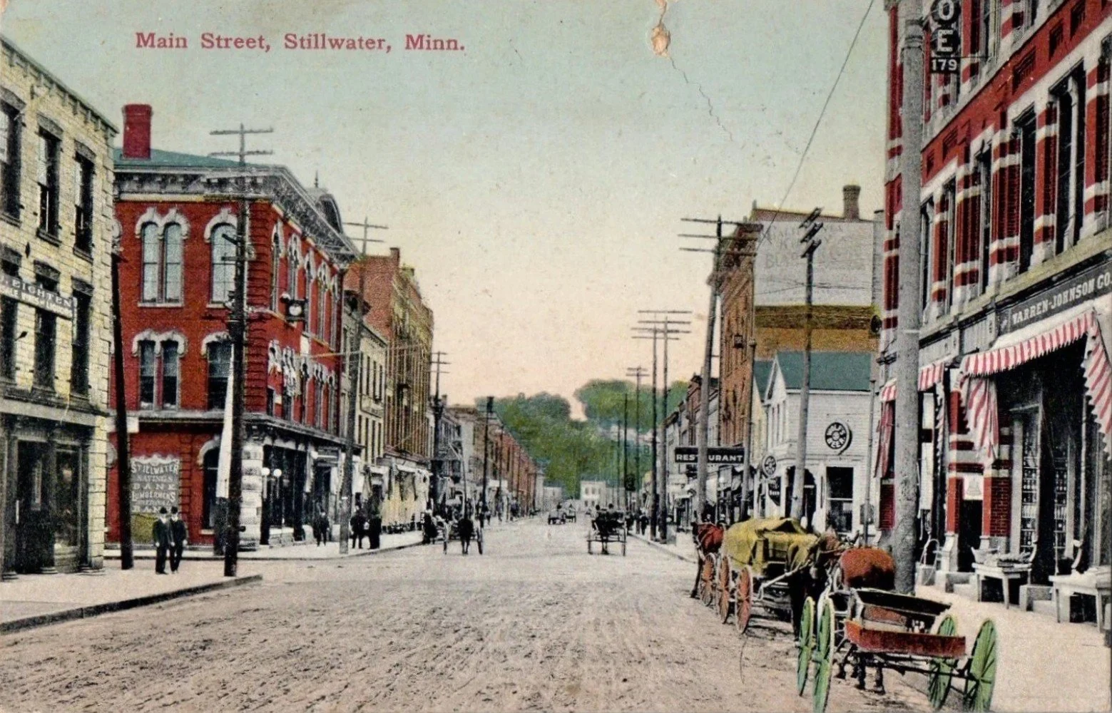 Postcard photo showing turn of the 20th century Main Street in Stillwater, Minnesota