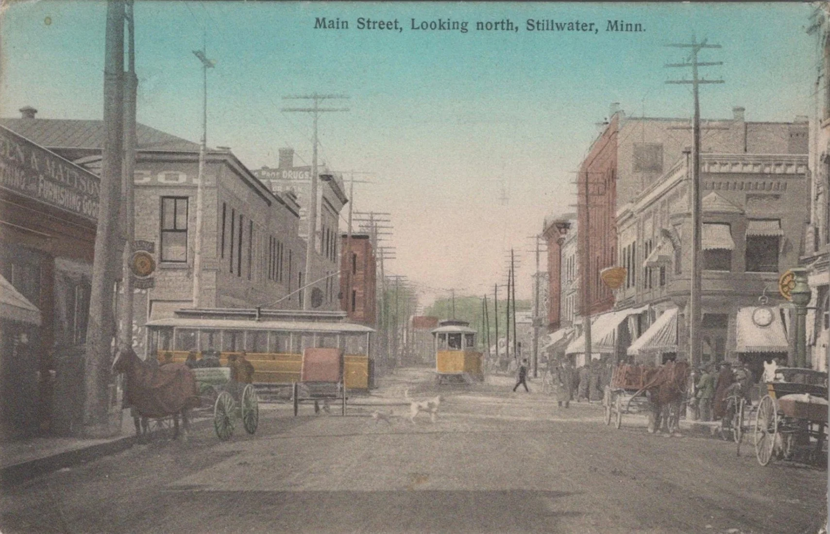 Postcard photo showing turn of the 20th century Main Street looking north in Stillwater, Minnesota