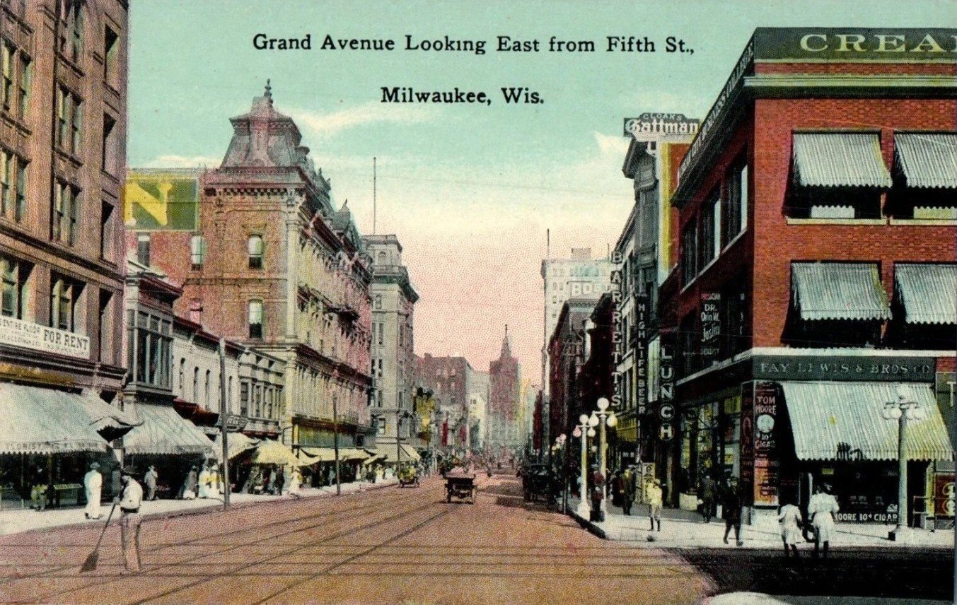 Postcard photo of Grand Avenue looking east from 5th Street in Milwaukee Wisconsin