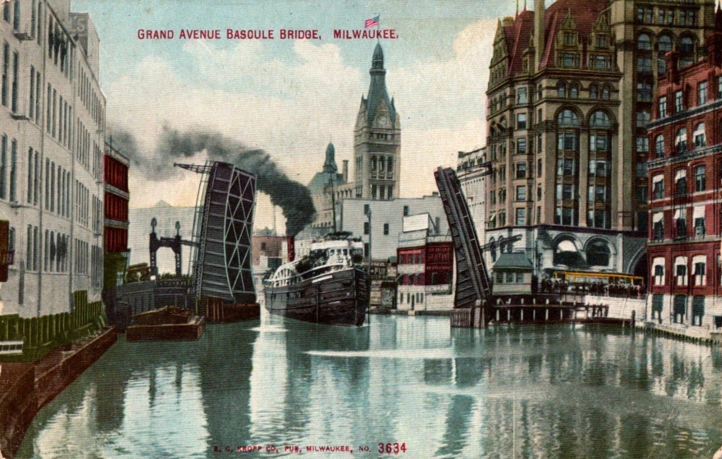 Postcard photo of the Grand Avenue Bascule Bridge raised for a ship to pass through in Milwaukee Wisconsin