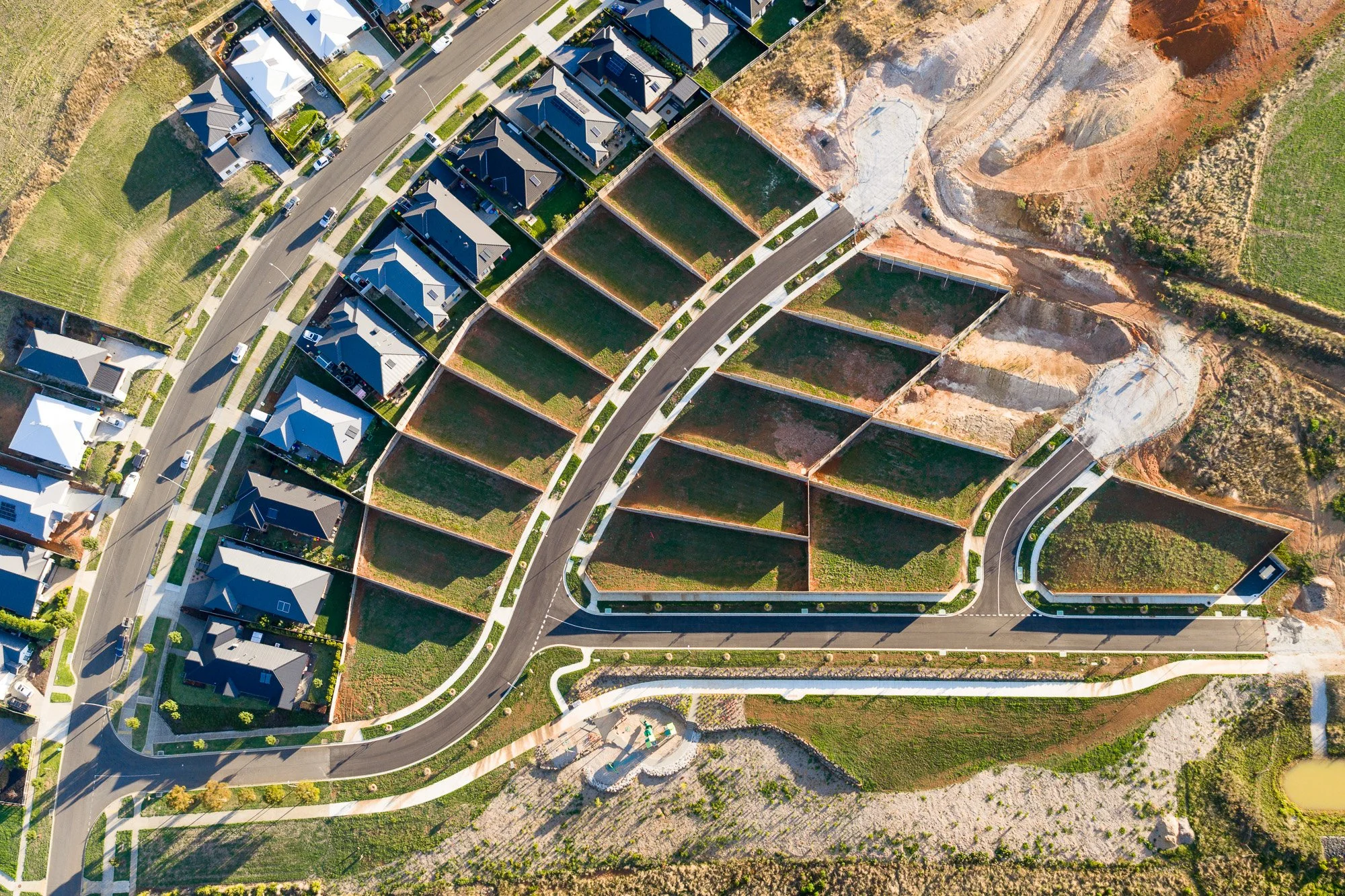 Aerial construction photography Gippsland residential subdivision with housing lots and roads