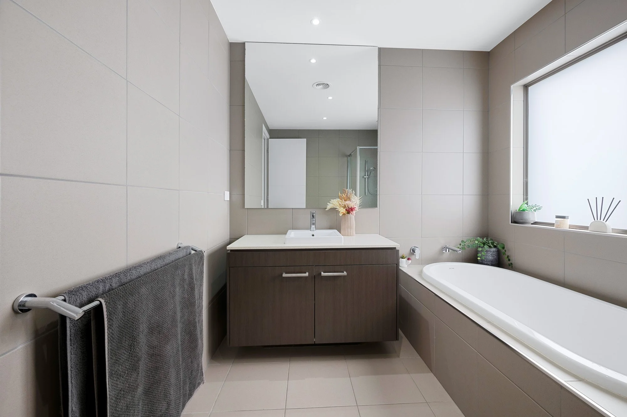 Real estate photography modern bathroom interior with clean finishes and soft lighting