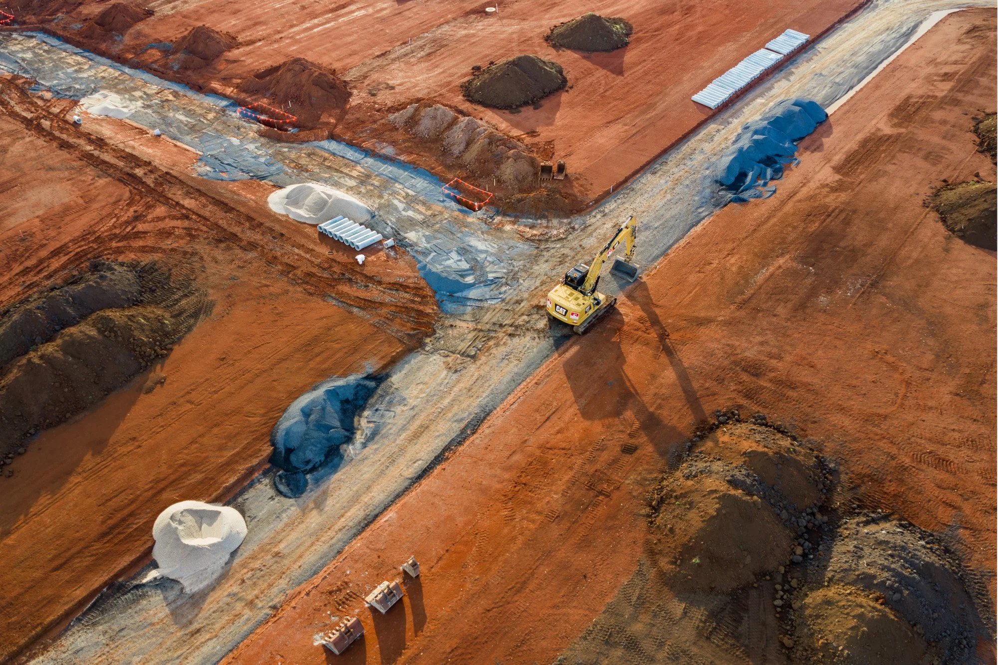 Construction photography Gippsland aerial showing earthworks and road development progress