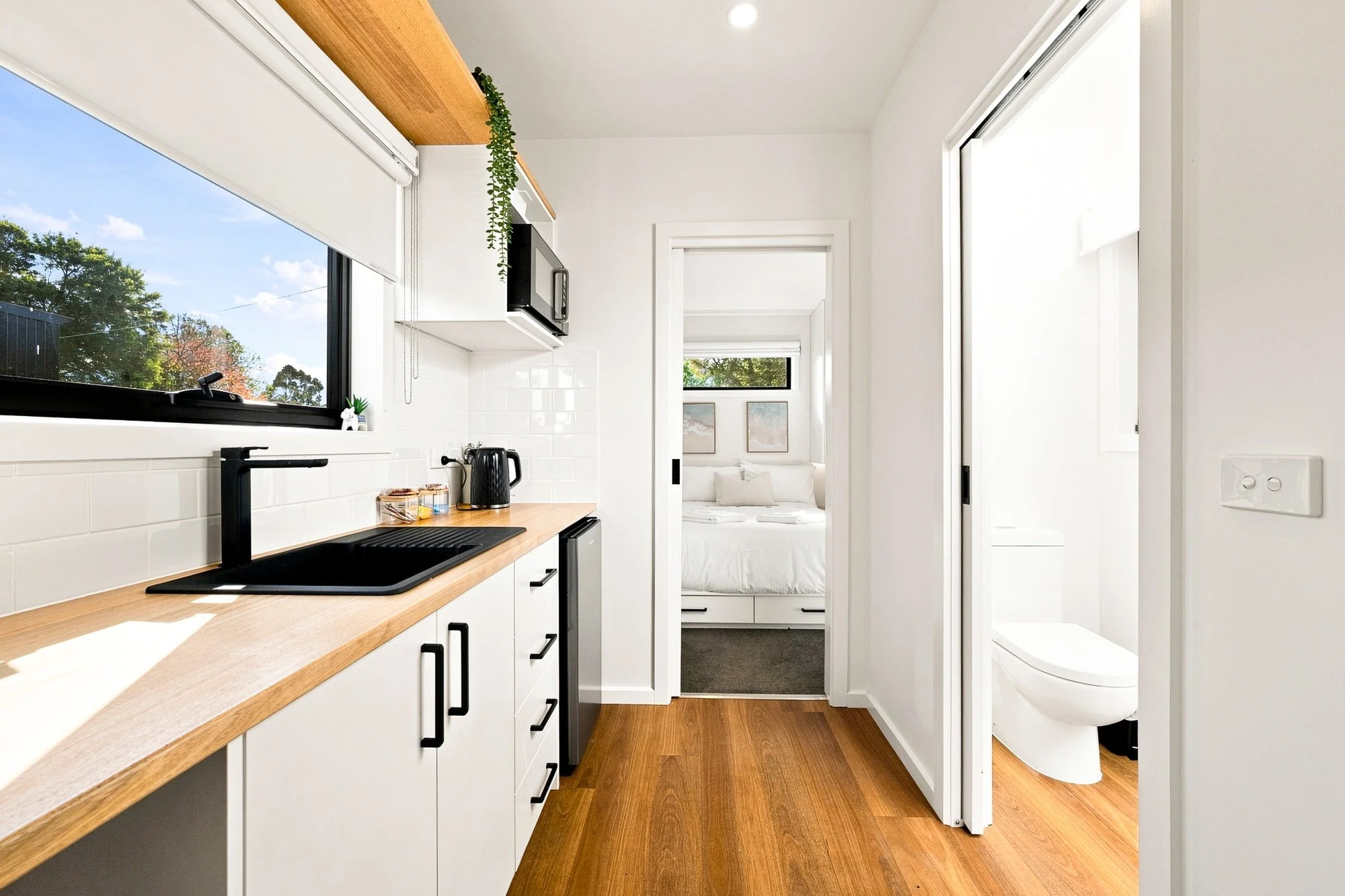 Modern holiday caravan park cabin kitchen and accommodation interior in Gippsland