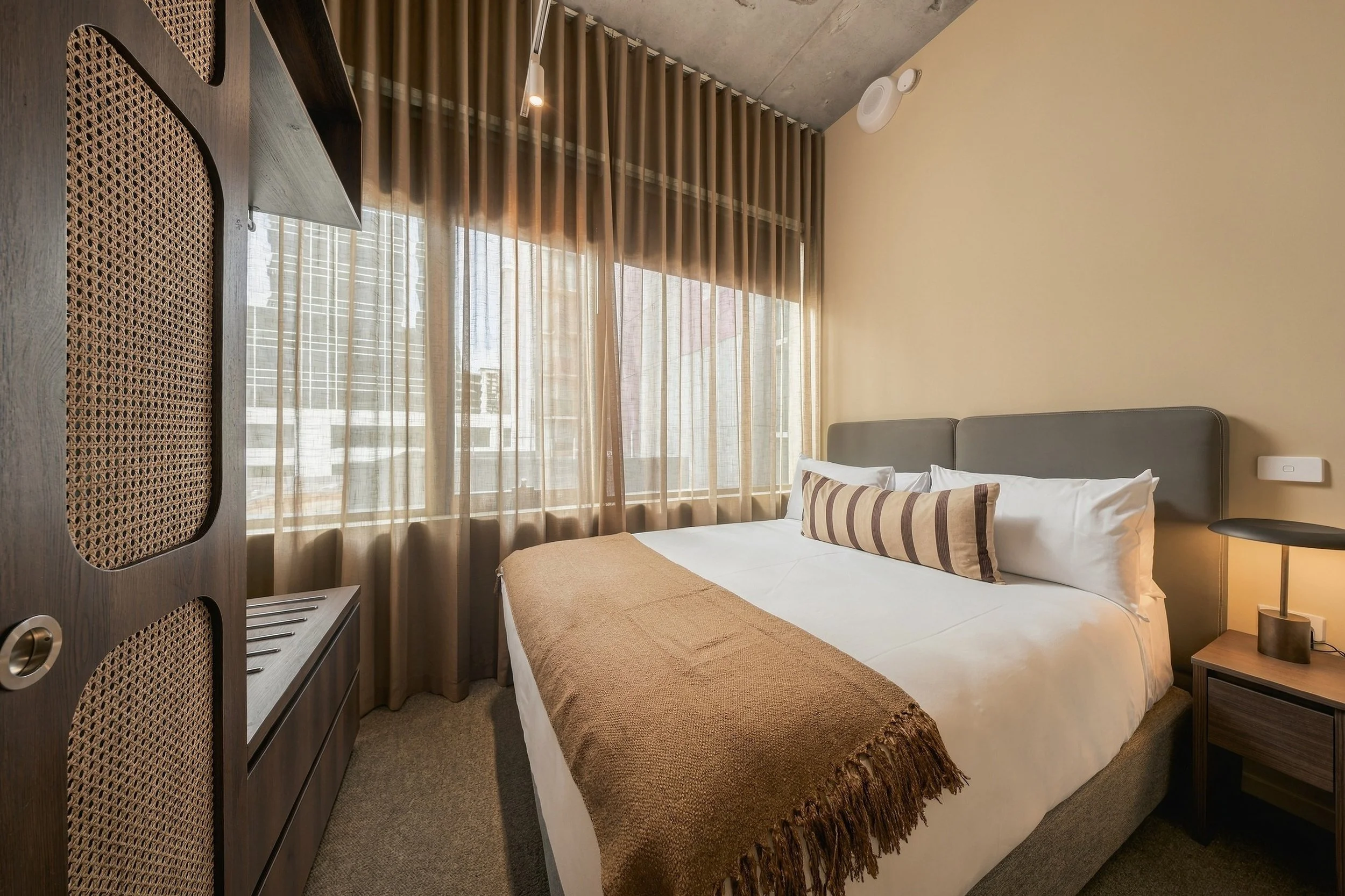 Modern boutique hotel bedroom interior photography at The Lane House, Melbourne.