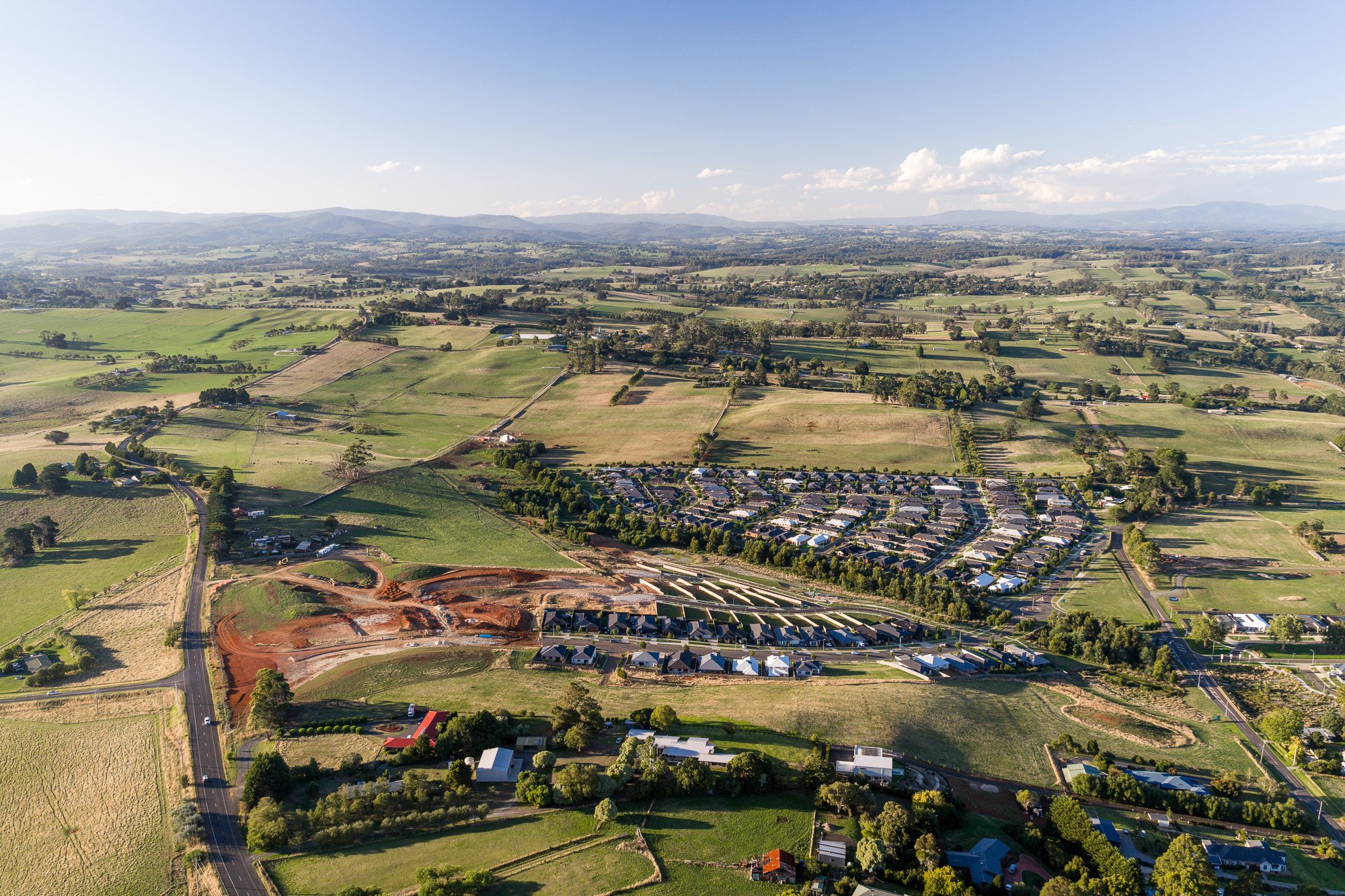 Development photography Gippsland subdivision aerial showing estate layout and surrounding land