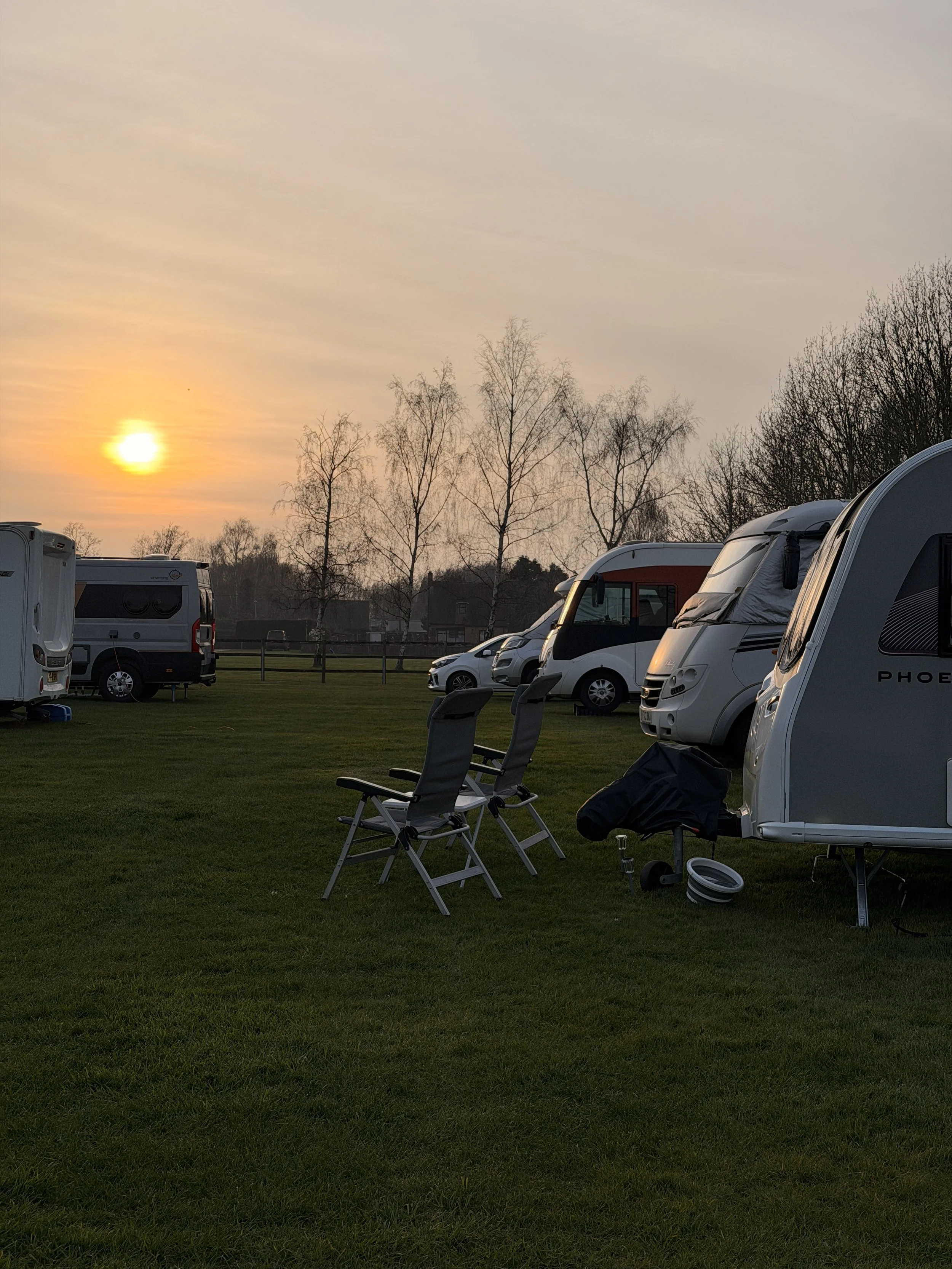 The Birches, Wyboston where the sun sets on a beautiful day of camping.