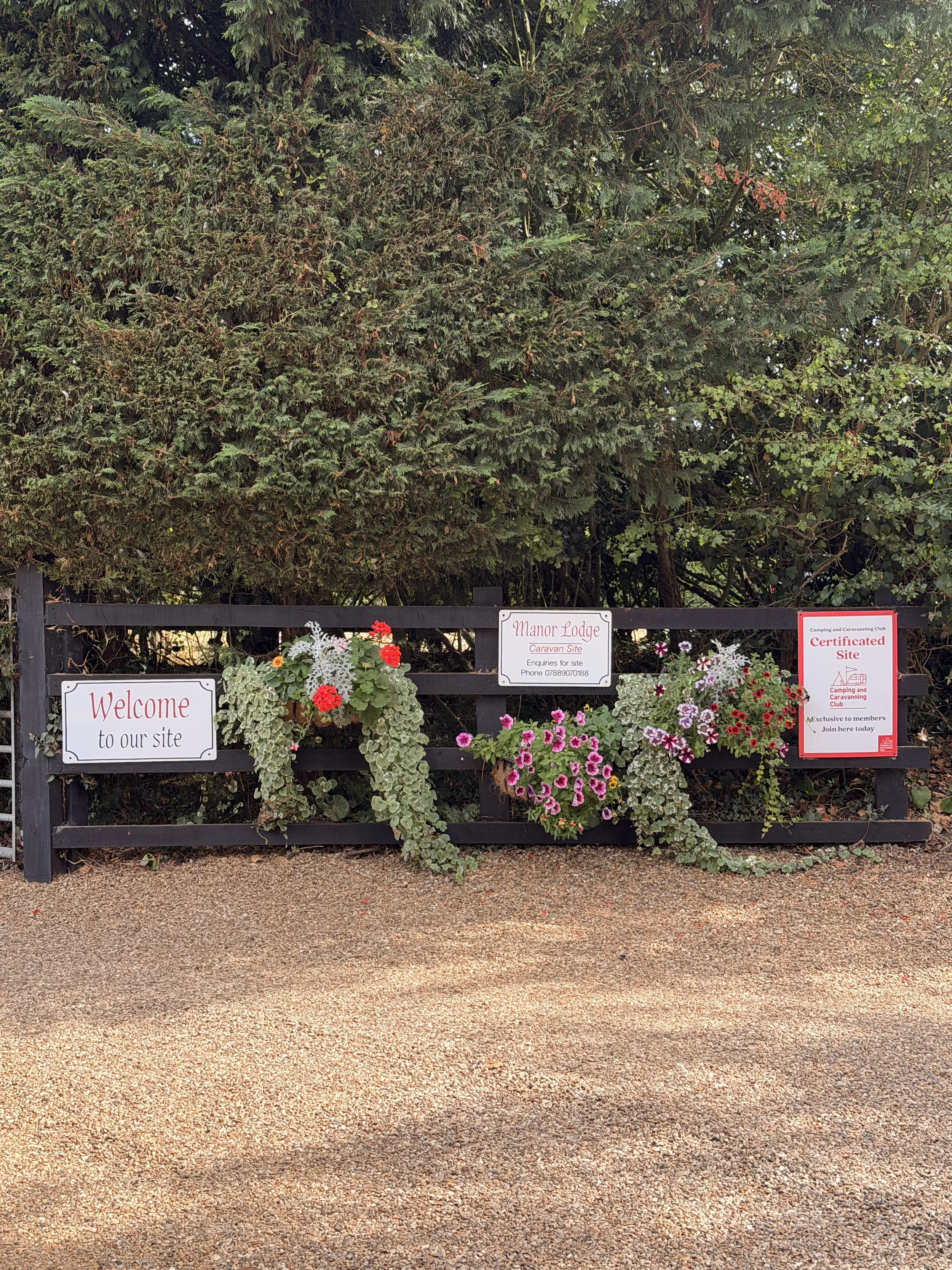 Colourful entrance to Manor Farm Caravan Park