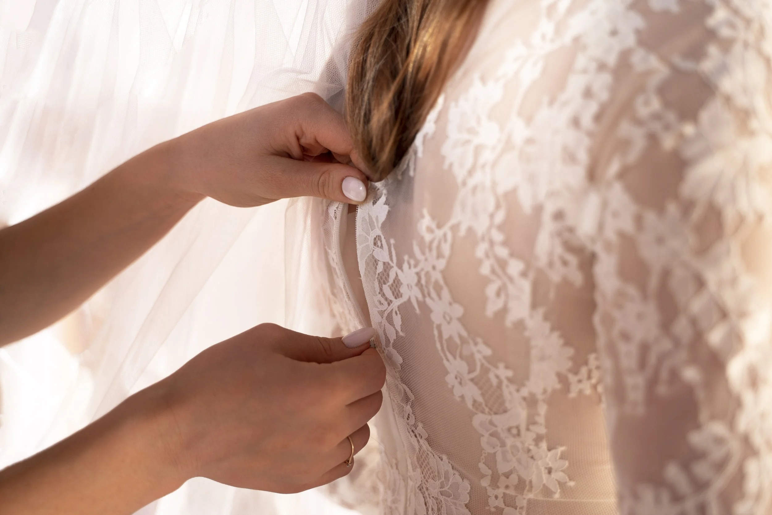 close-up-bride-getting-dressed.jpg