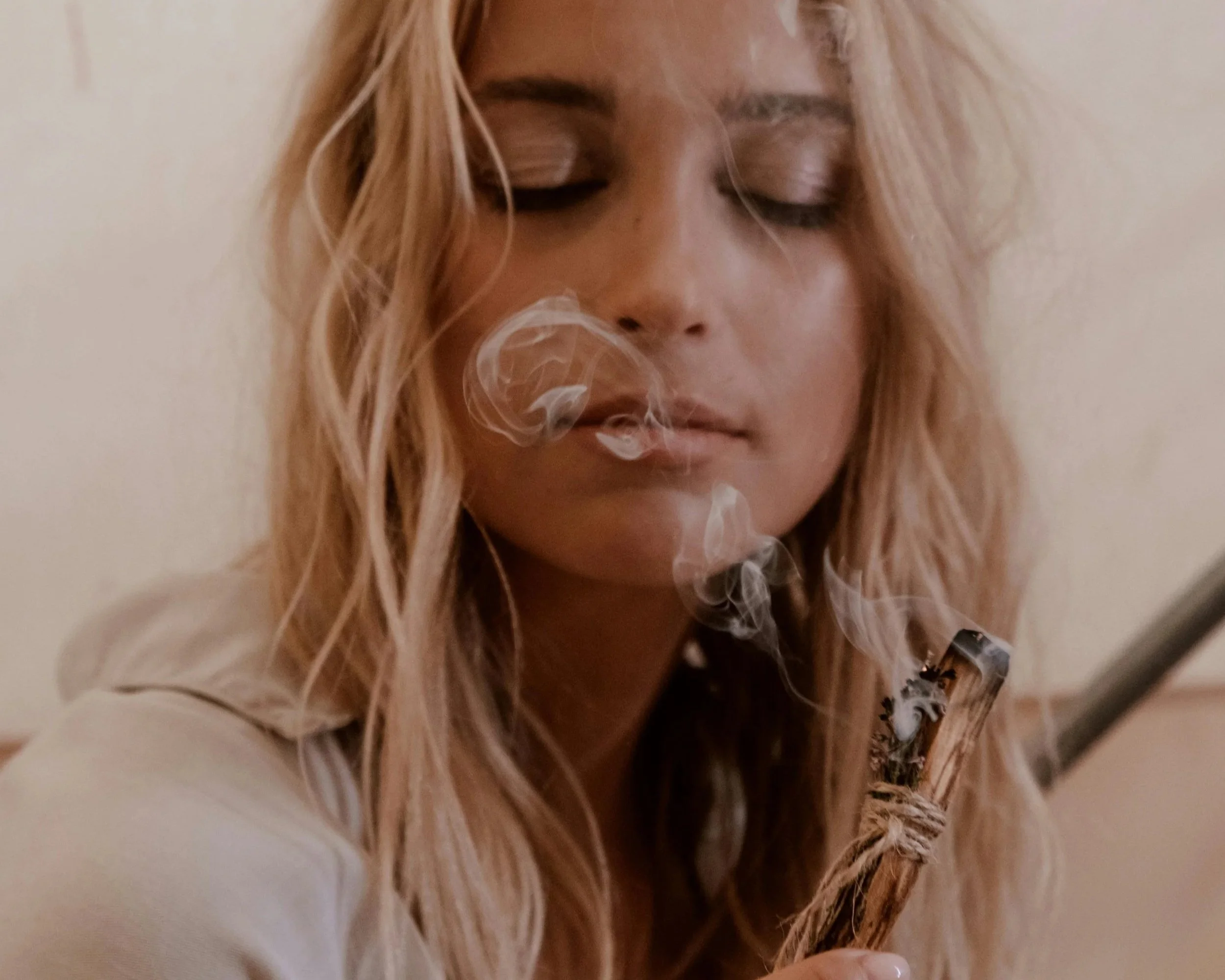 woman with palo santo
