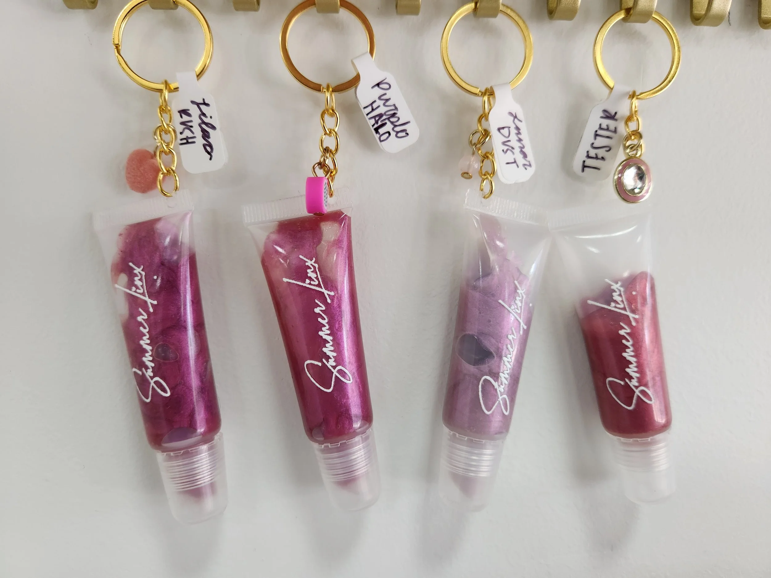 Lip gloss tubes with charm