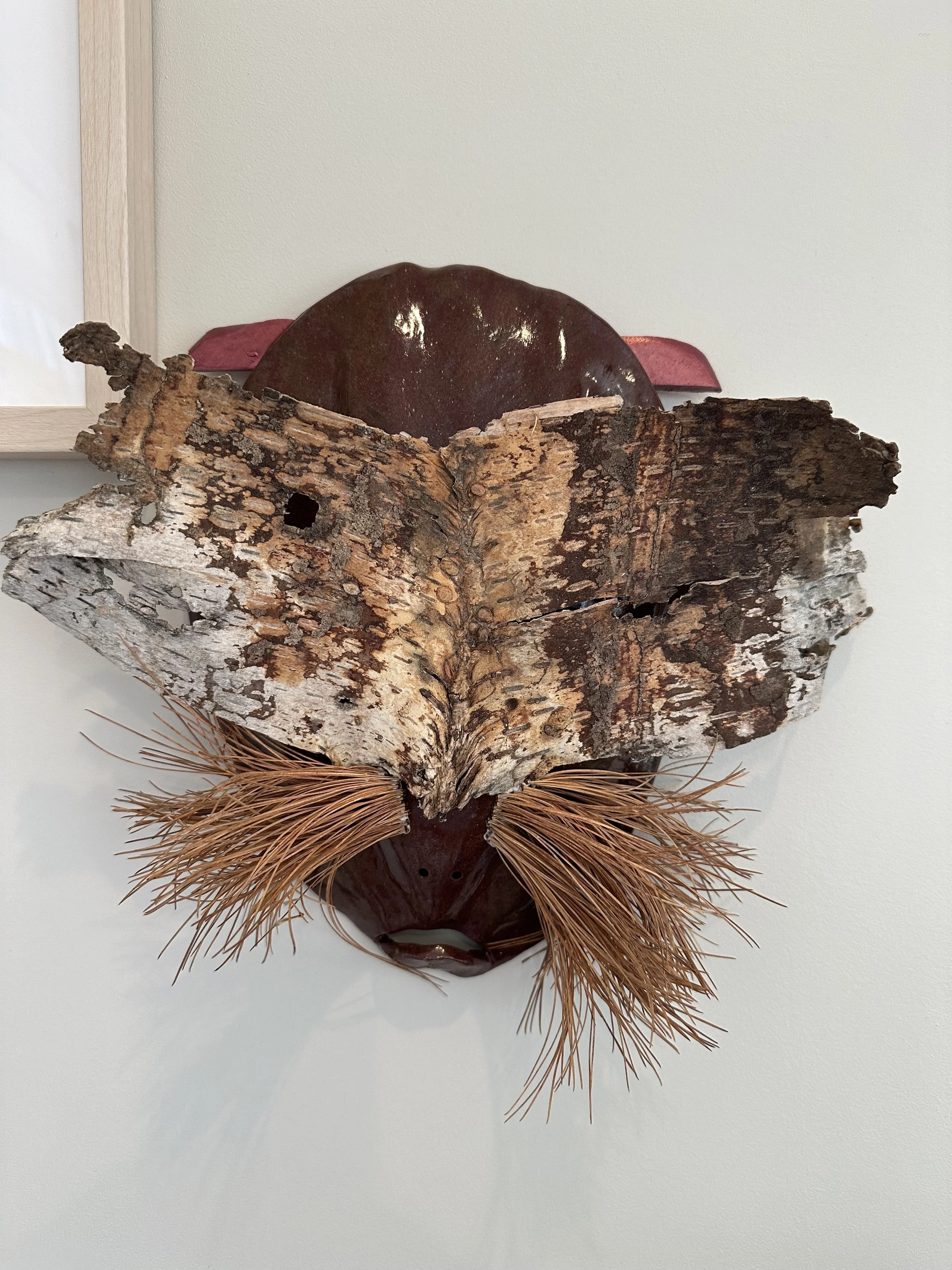 Disguised. 
A walk with my dog led me to the birch bark and my mind started playing with the idea of creating a mask. Who will be wearing it? Why hiding? From fox to ET, it all came to how we show who we really are. Or maybe we shouldn't.