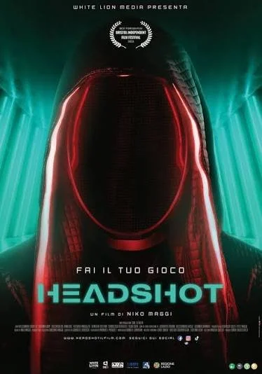 A poster for the film 'Headshot' featuring a dark background with a large, stylized red and black helmet or mask, with teal accents on the sides and glowing elements, and text in Italian.
