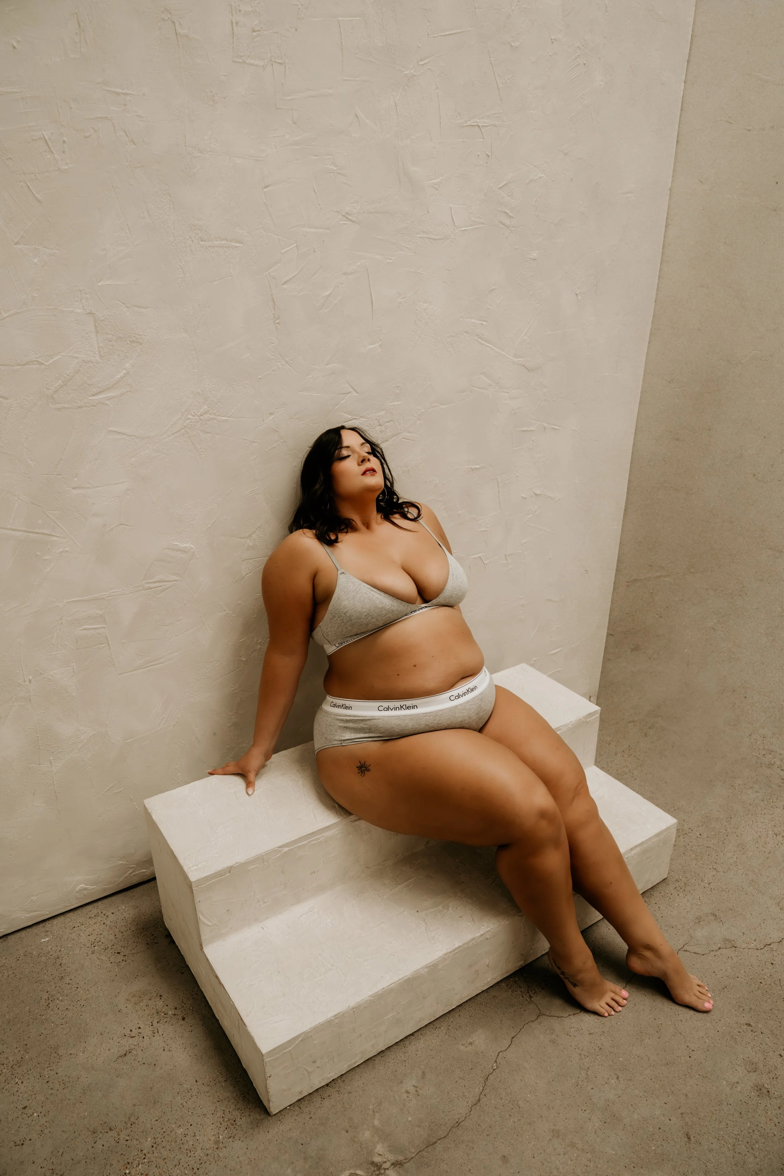 plus size woman calvin klein boudoir.jpg