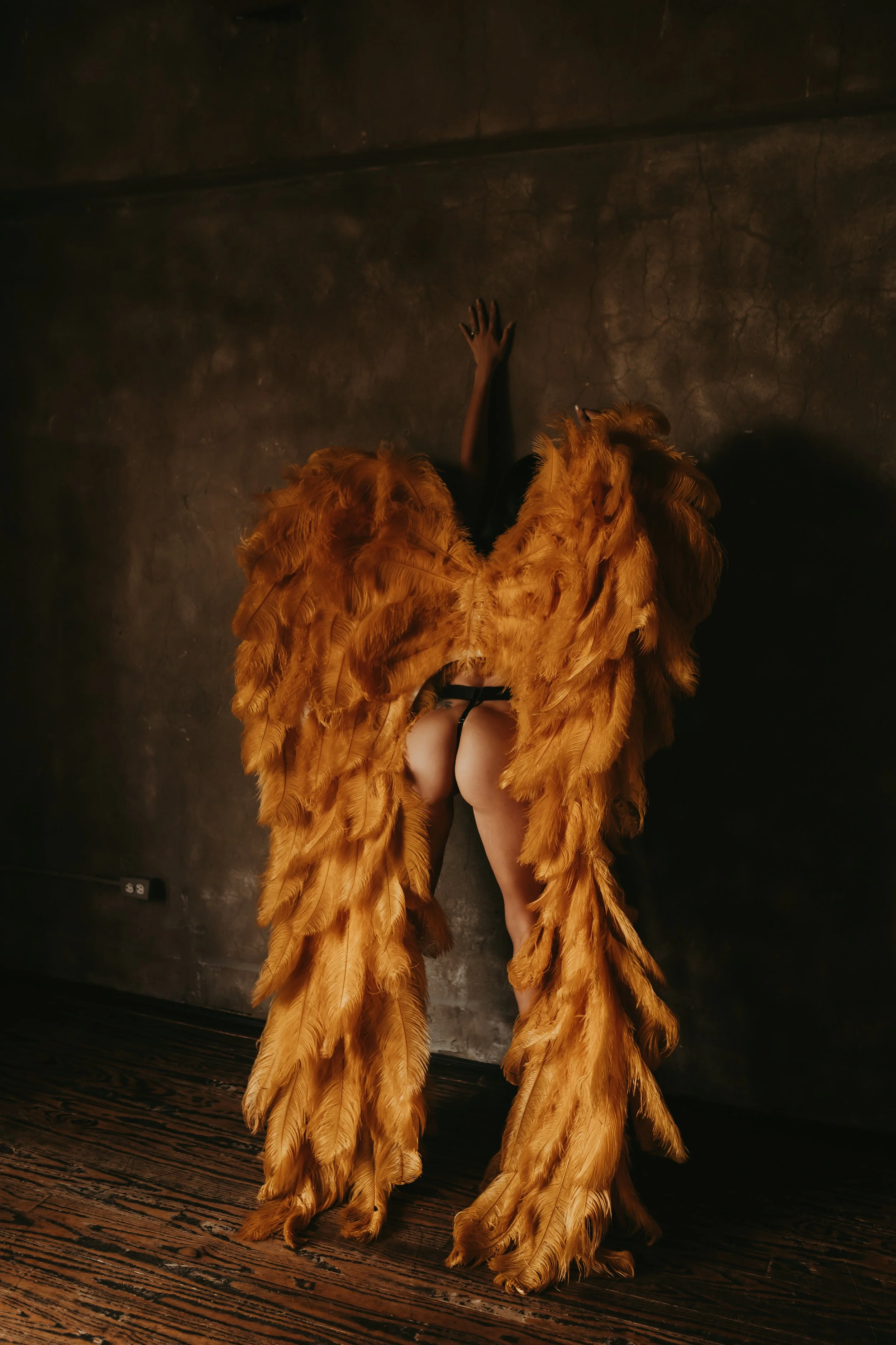 angel wing yellow boudoir photoshoot