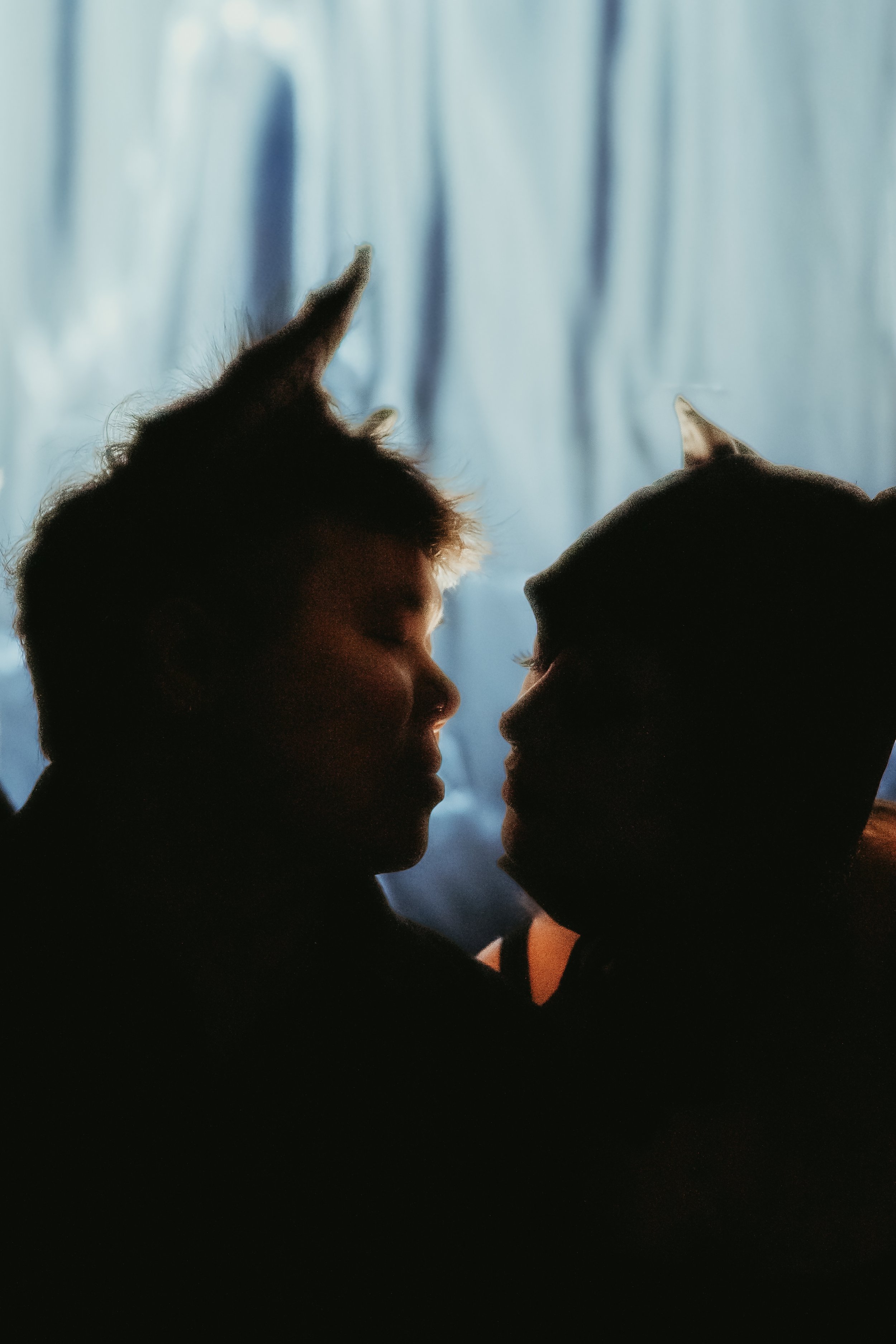 Intimate close up images of two people about to kiss