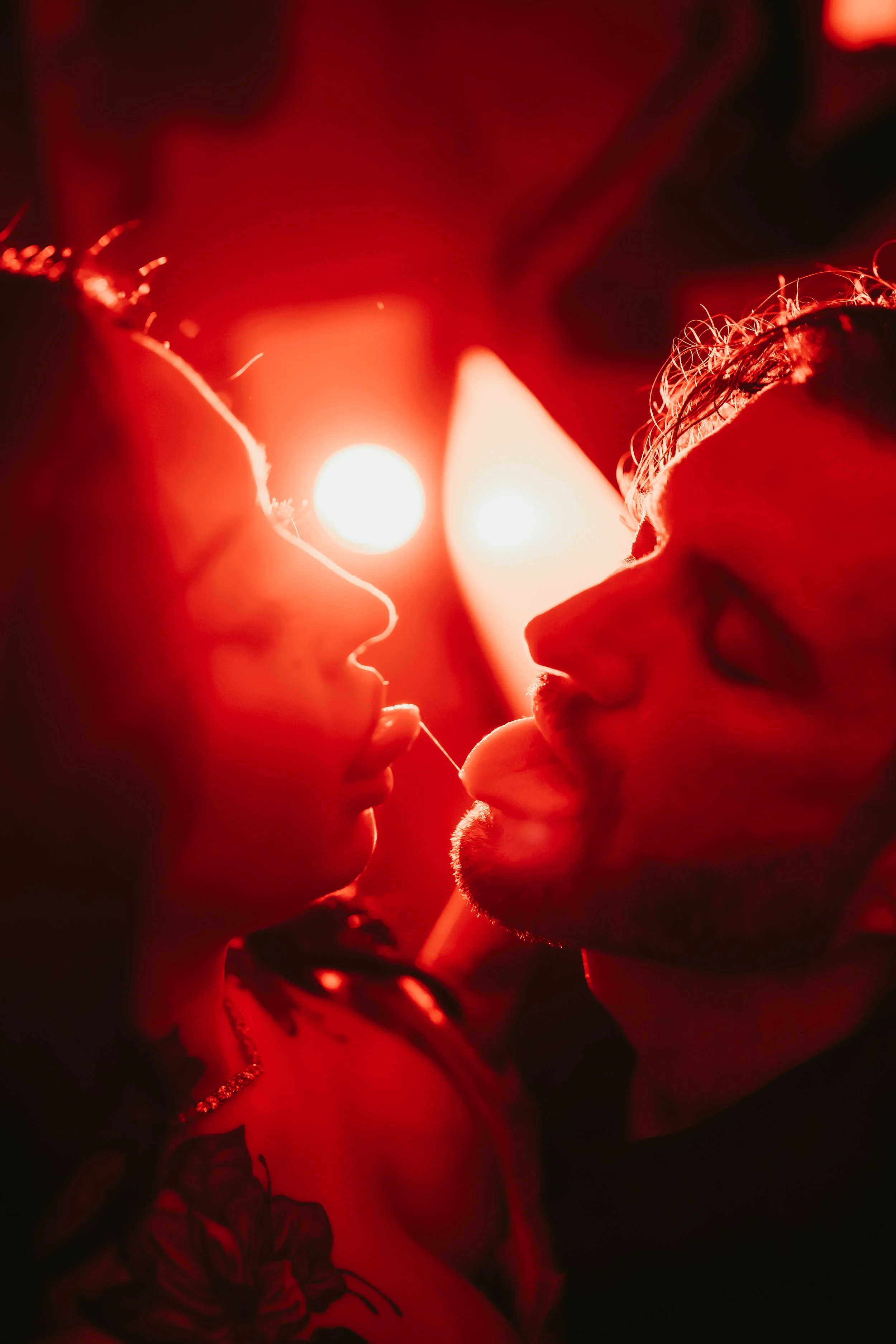 Kinky spit couple boudoir.jpg