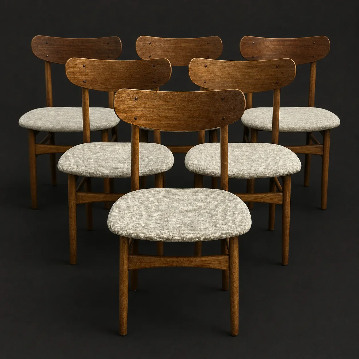 Set of six mid-century modern Danish teak back dining chairs with upholstered seats, from the 1960's.
