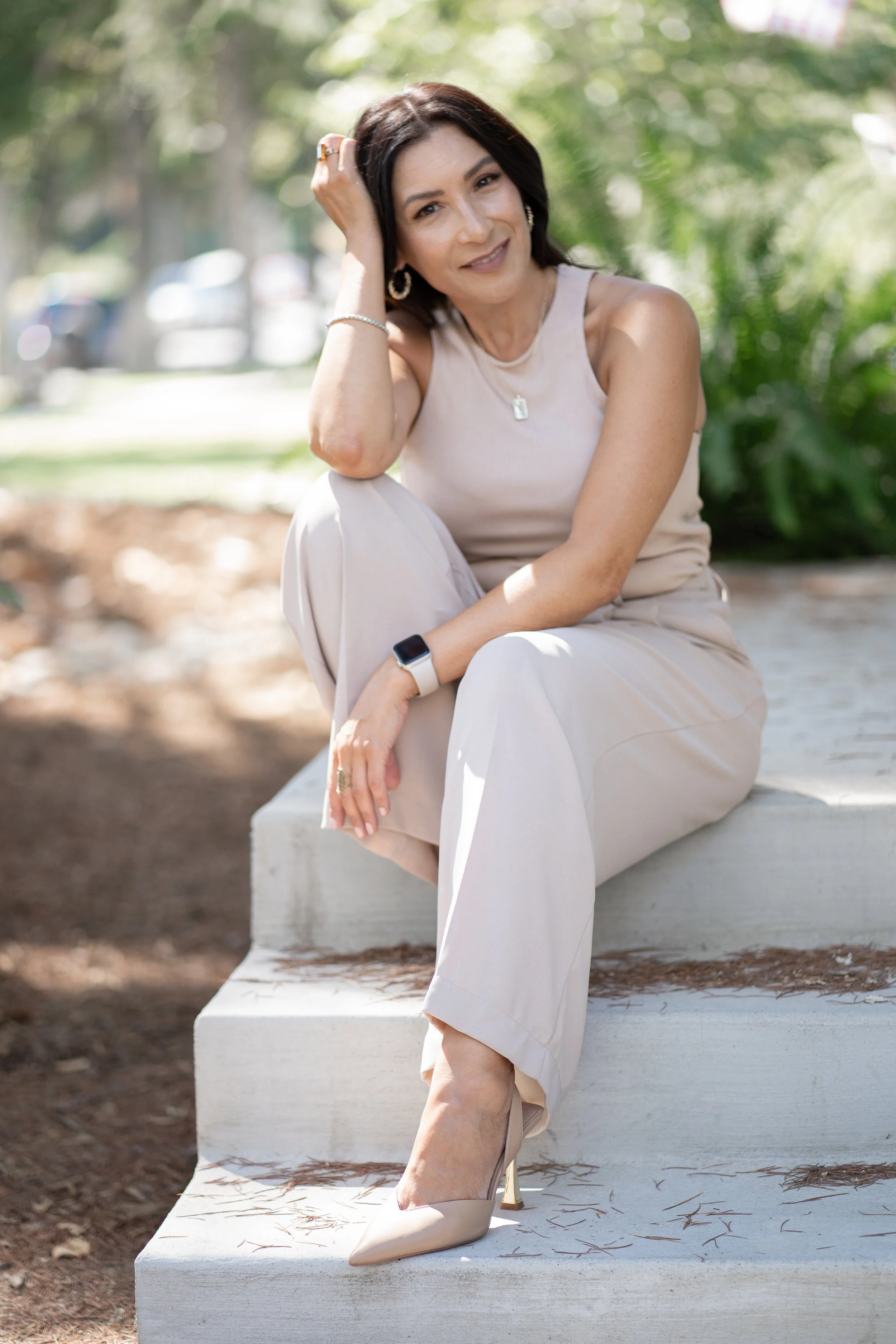 Sonia Life Coach sitting on steps