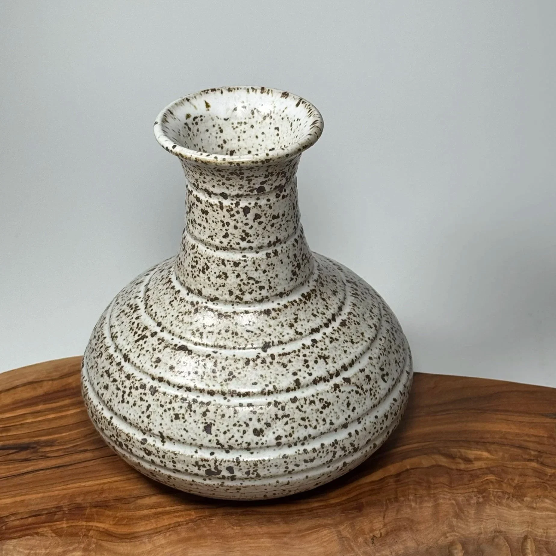 VASE, CARVED, SPECKLED IRON
