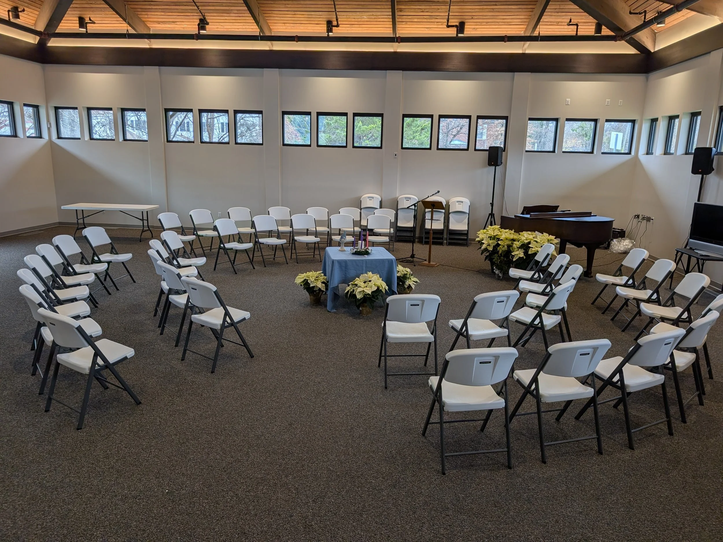 Community Hall set up with chairs in a circle for a ceremony