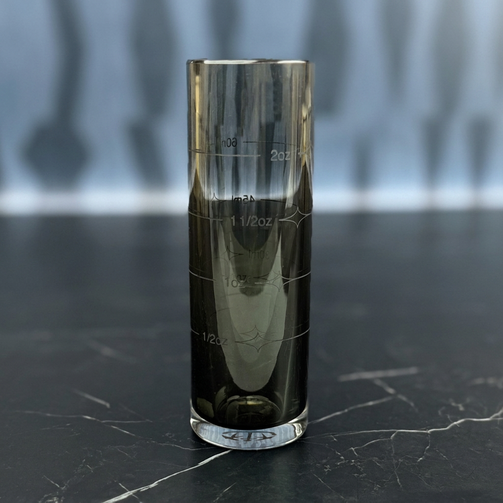 handblown gray glass cocktail jigger