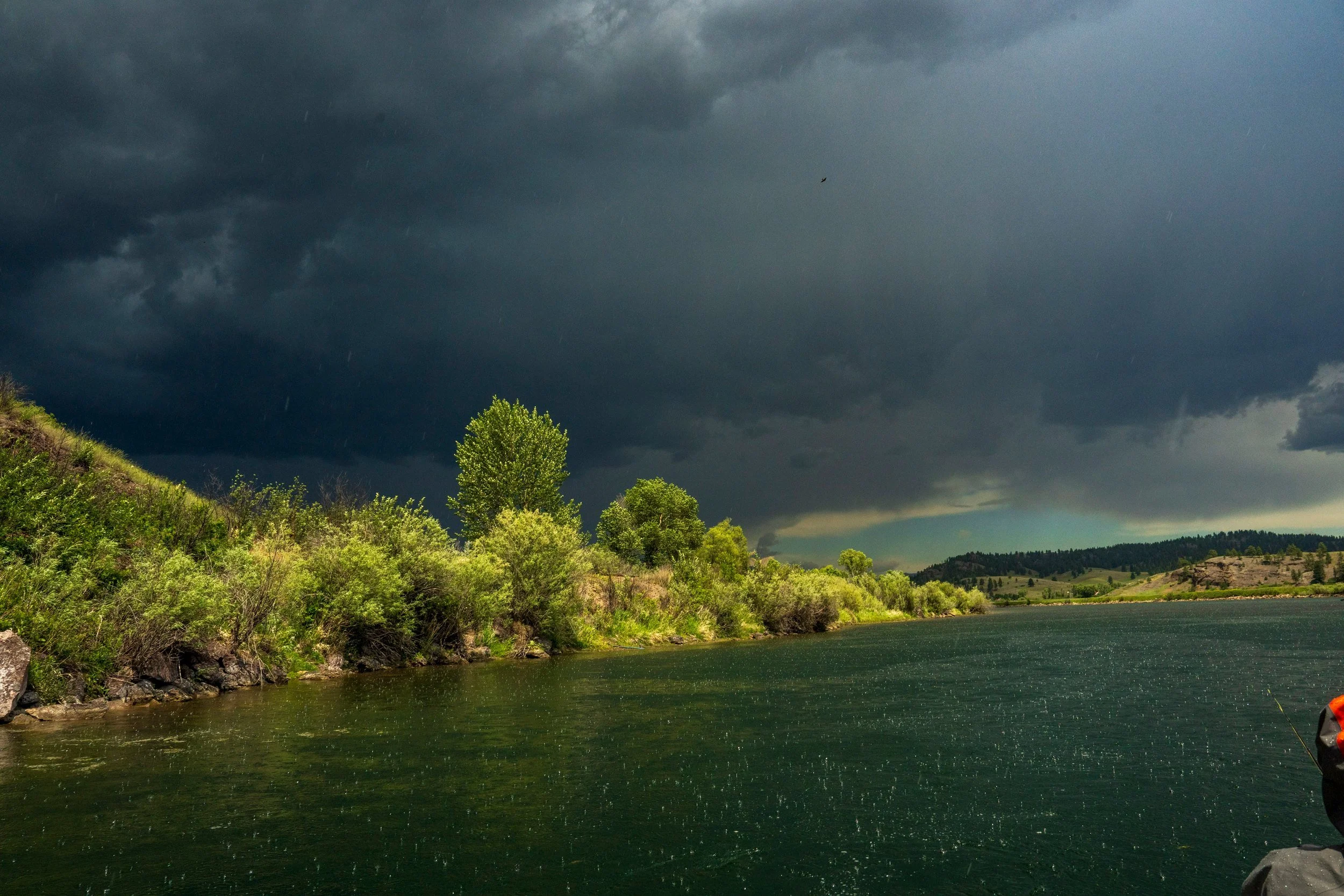 Storm brewing over the riverbank, Montana