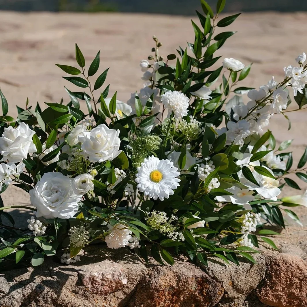 An example of a faux floral arrangement available for rent from JayBird Weddings and Events.