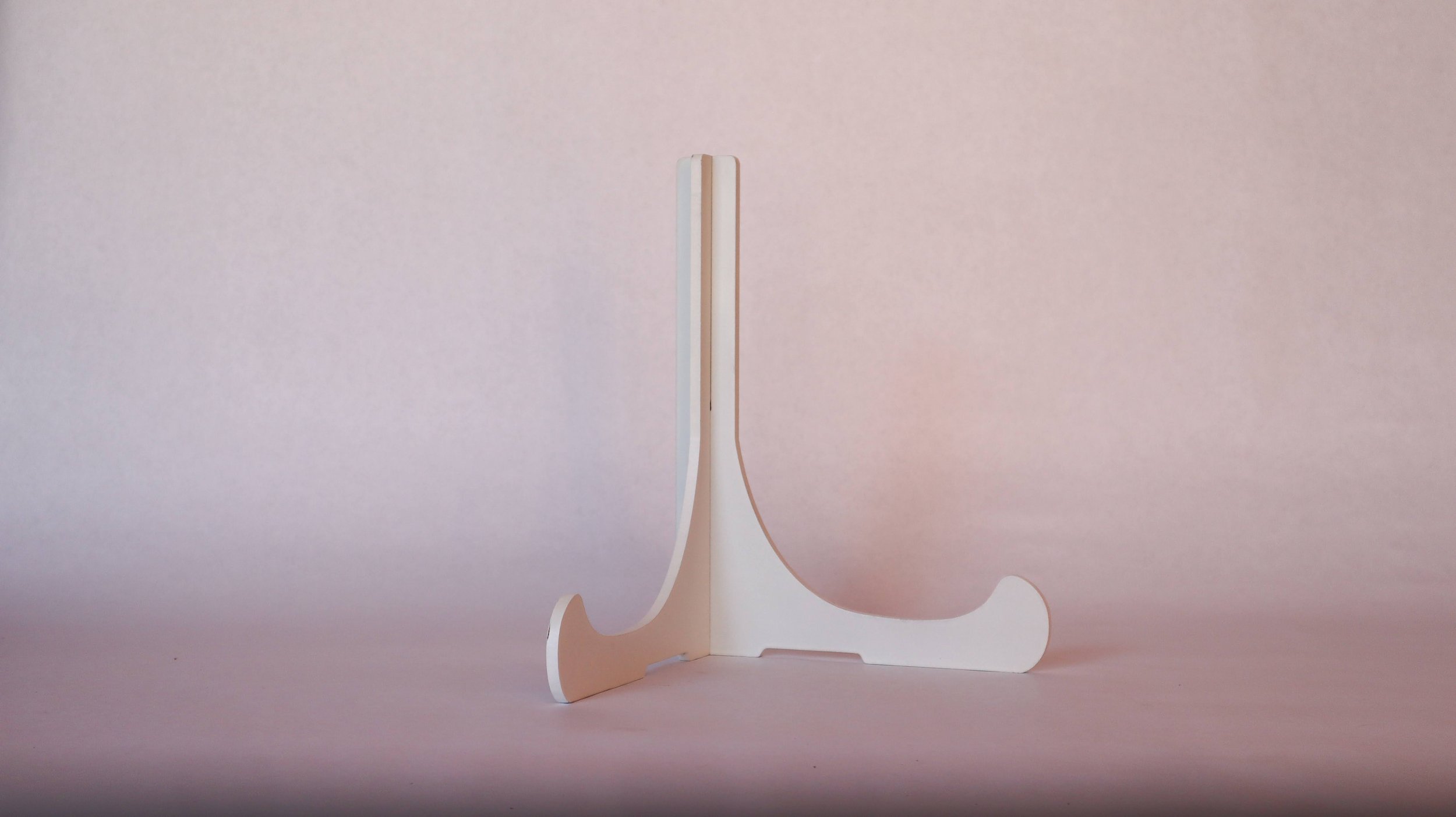 White Wooden Sign Stand available to couples who have their Colorado wedding planned by JayBird Weddings and Events