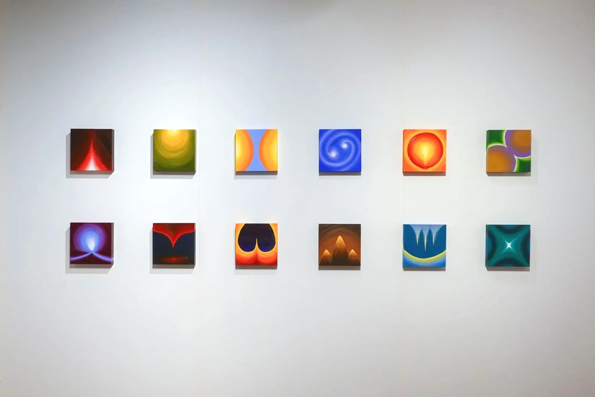 Evolution (circle of animals), 2026, acrylic on twelve wooden panels, 8 x 8 inches each