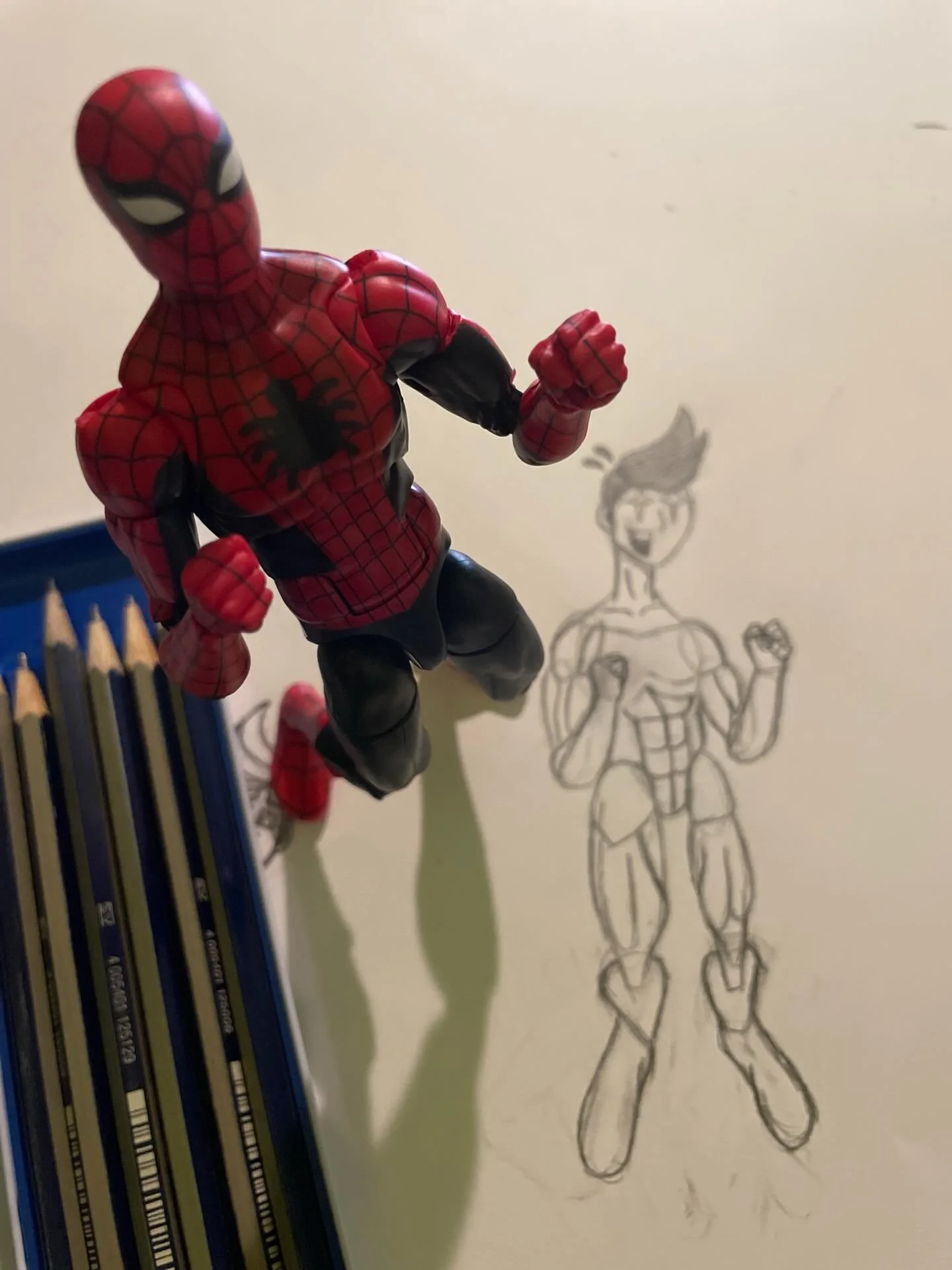 Spider Man, Spider Man, does whatever a spider can&hellip;
Like help me out with drawing anatomy!

I recently got a spider-man figure so I can draw characters quickly, but still adding some accuracy into my work. 

He doesn&rsquo;t have every detail 