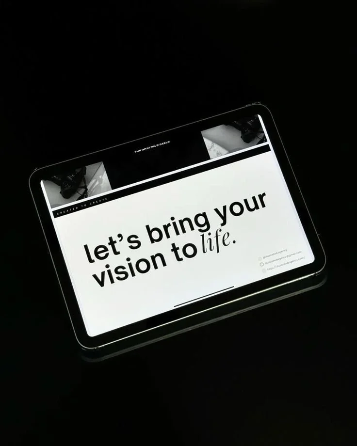 Tablet displaying text "let's bring your vision to life." on a black background.