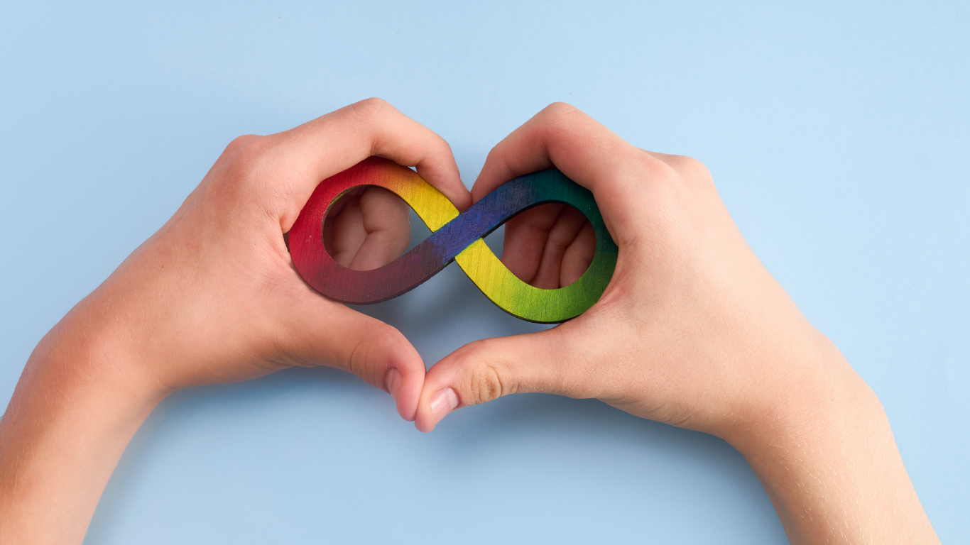 hands holding infinity symbol to support neurodiversity spectrum