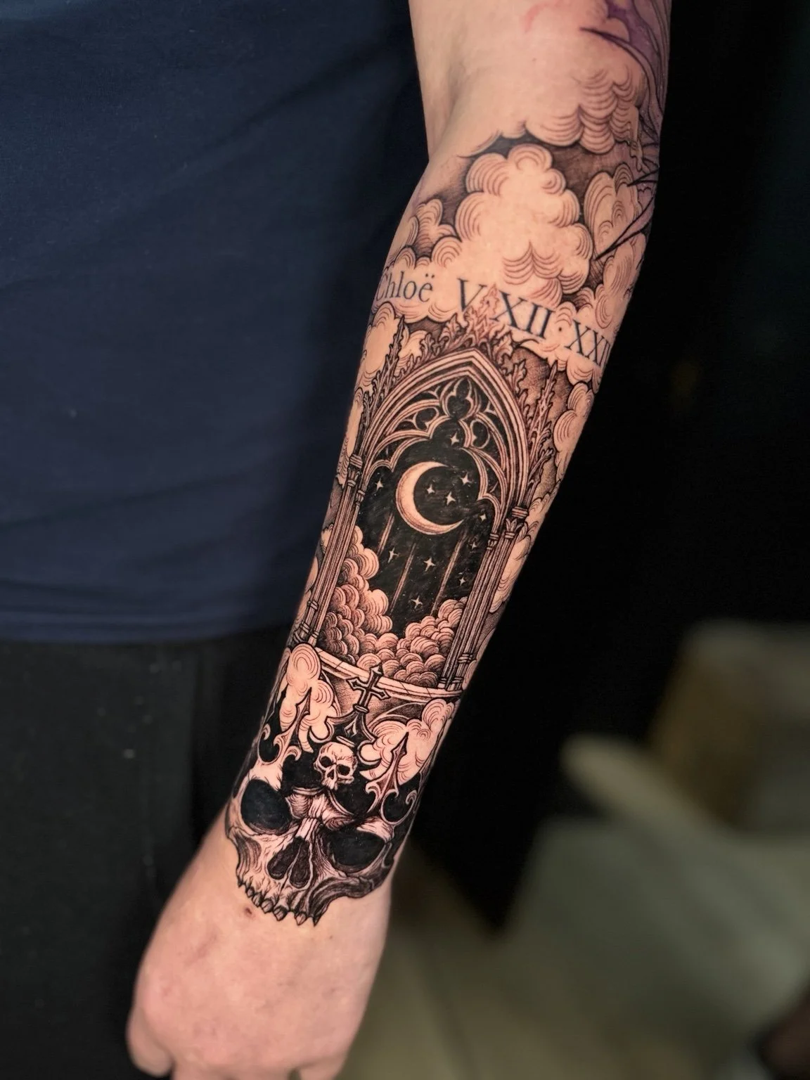 Black and grey eye, clock and geometric forearm tattoo by Alina Horobets, Bournemouth