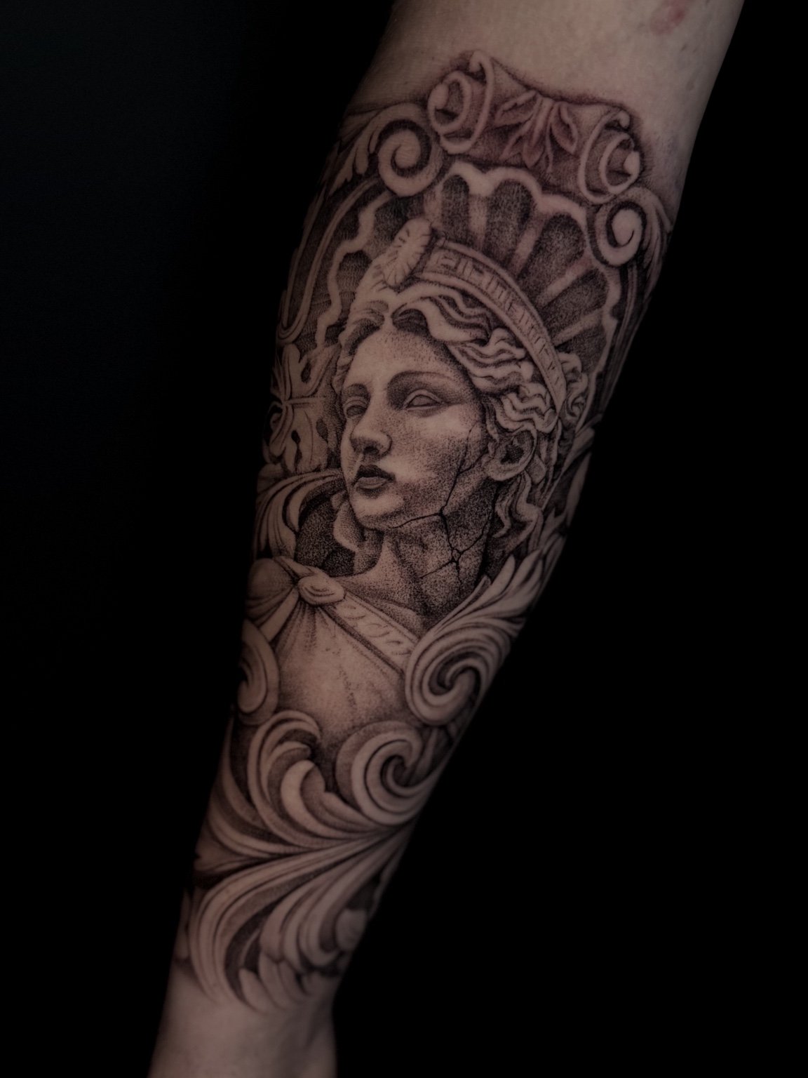 Black and grey Statue of Liberty forearm tattoo by Alina Horobets, Bournemouth