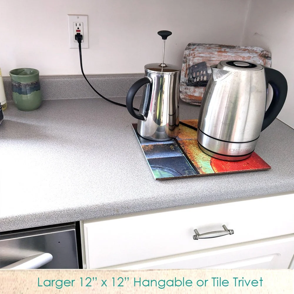 Large 12 x 12 tile used as a trivet.jpg