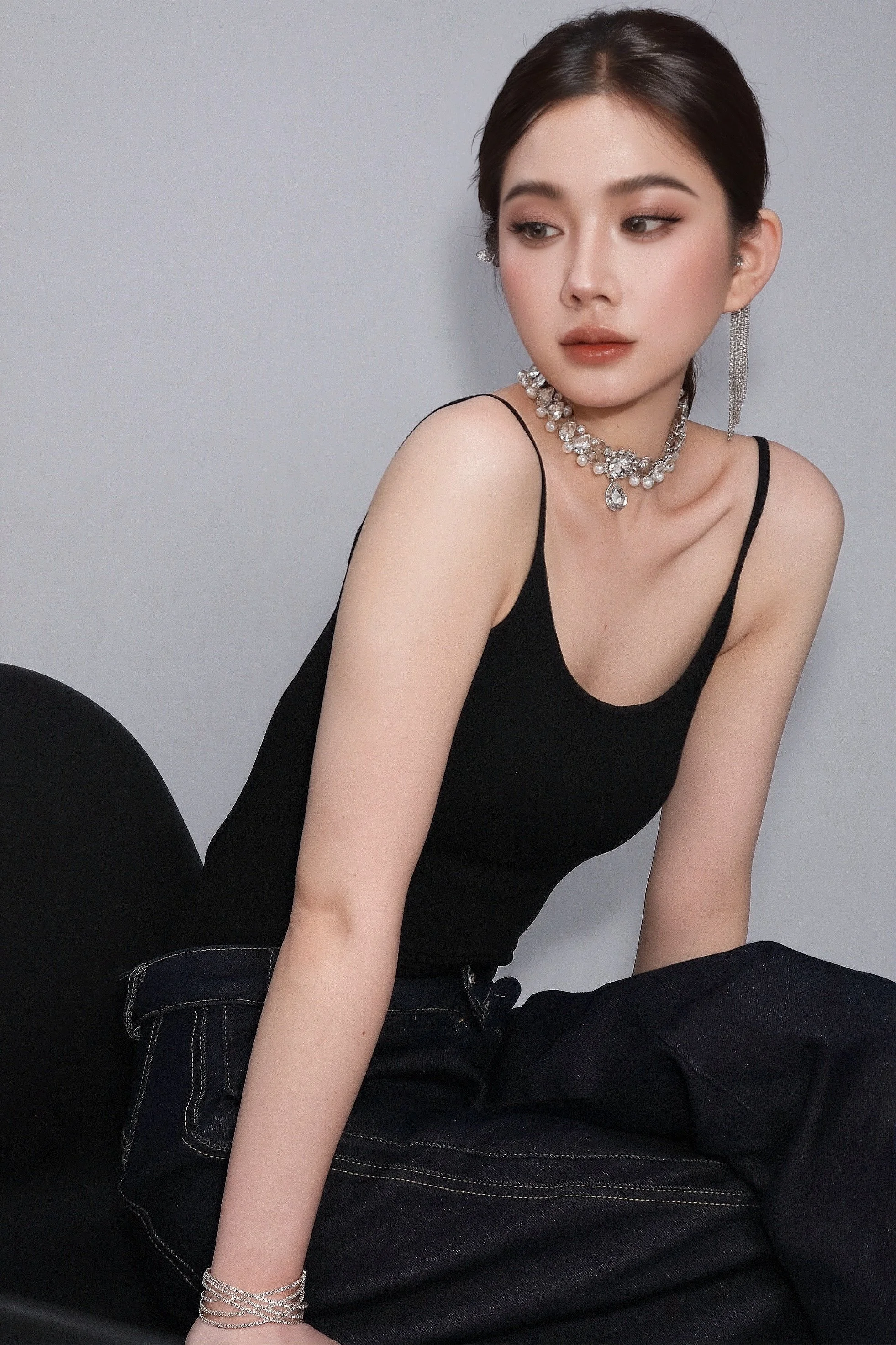 Aesthetic minimalist portrait of a woman sitting with neutral expression