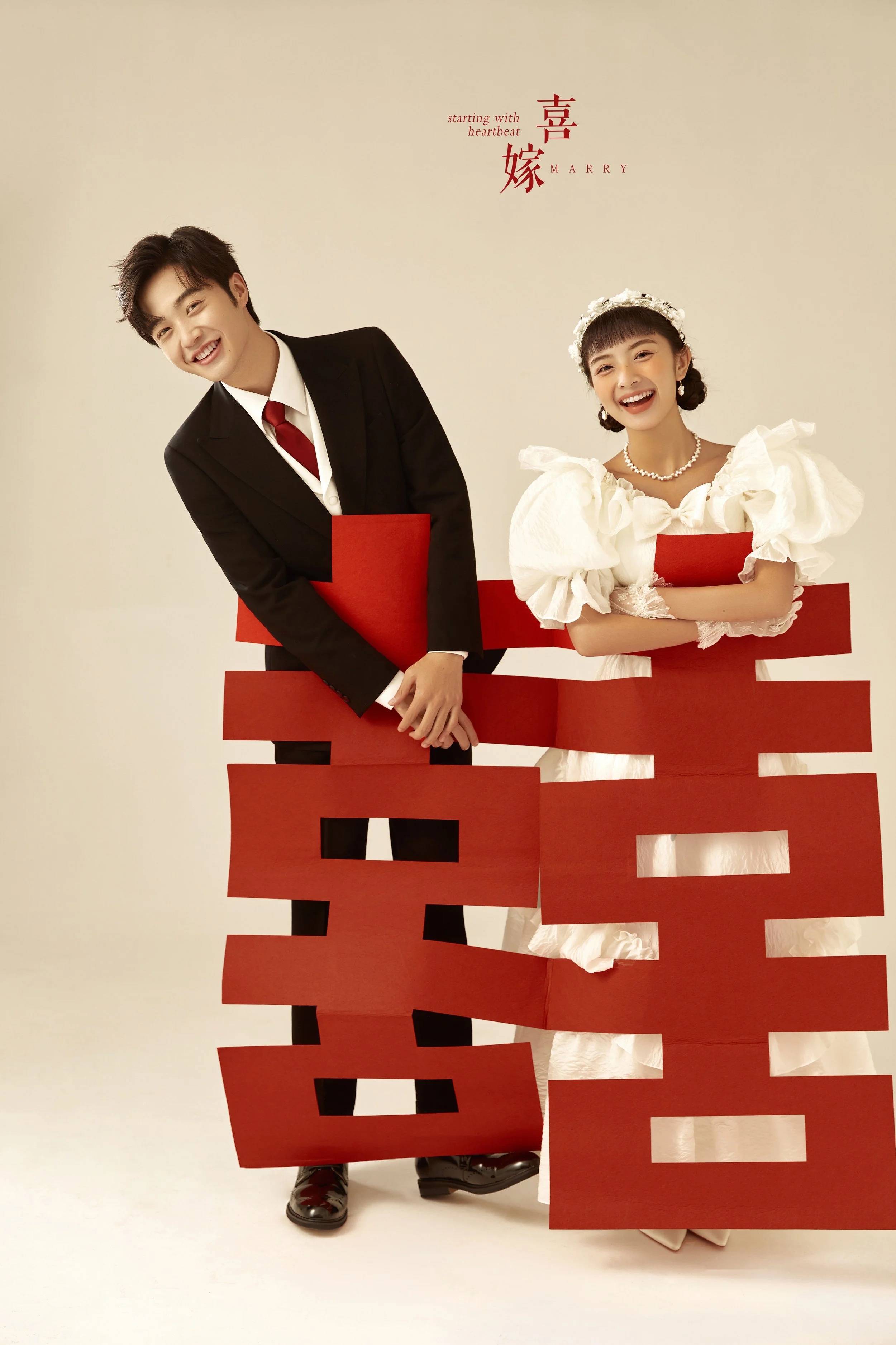 Cute young Asian couple pre-wedding photoshoot wearing Western suit