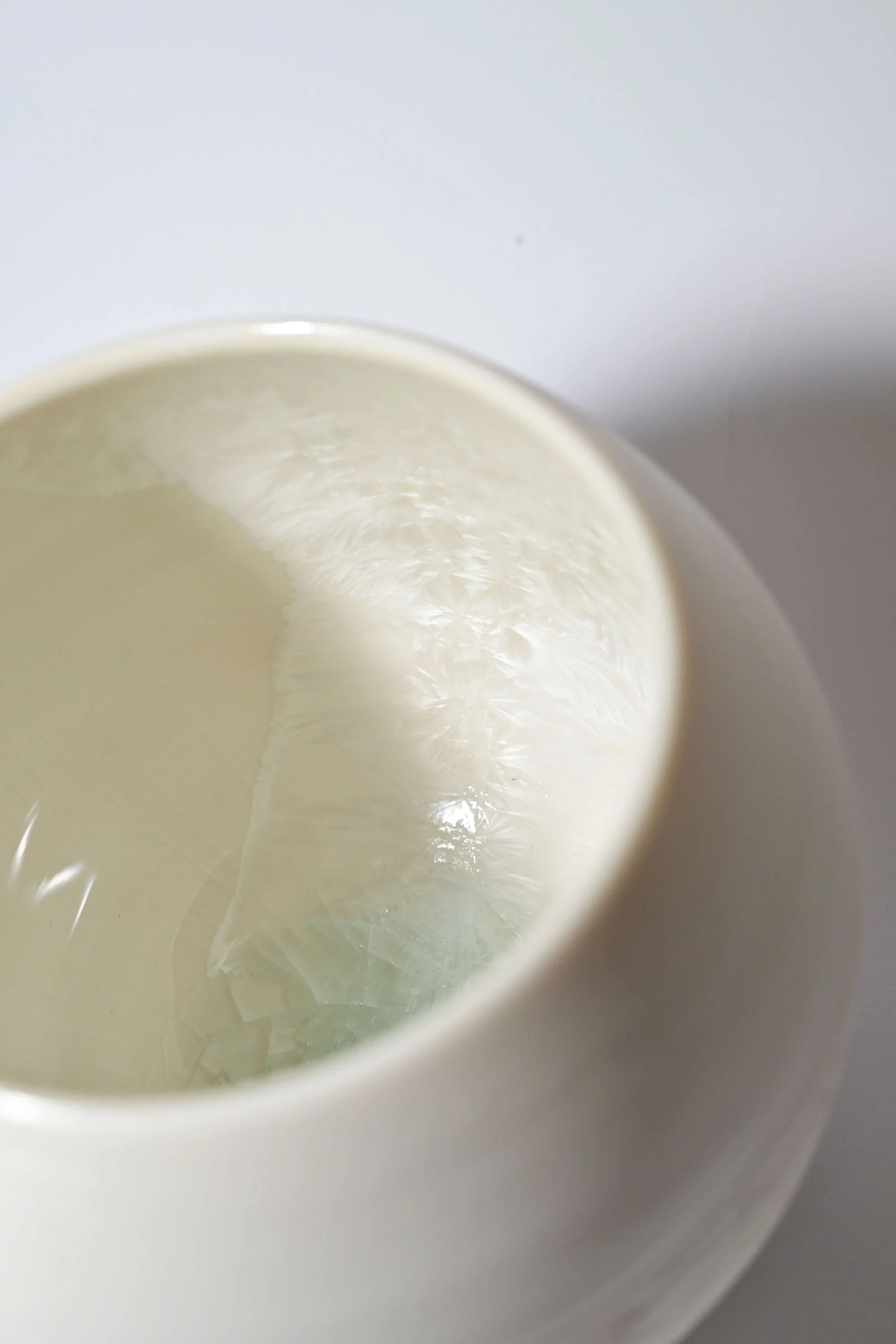 Landscape 3 Thrown porcelain vessel with white crystalline glaze inside and carved exterior inspired by Irish landscape by Irish Ceramicist Anna Smyth Ceramics 3.jpg