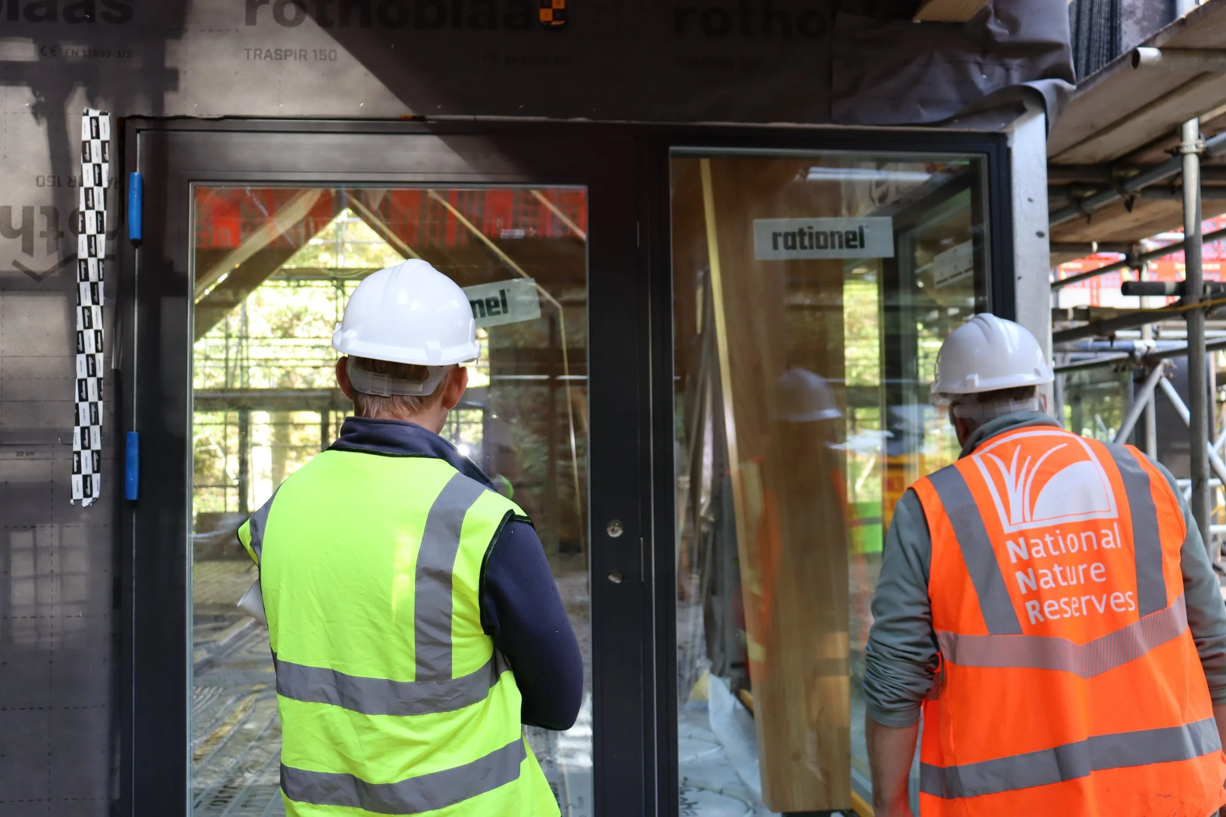 Andrew Bakere and David Rickwood admiring the classroom.