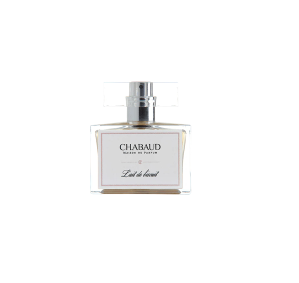 Flacon de parfum Chabaud maison de parfum avec étiquette "Lait de Biscuit" et un panier en verre transparent à côté.