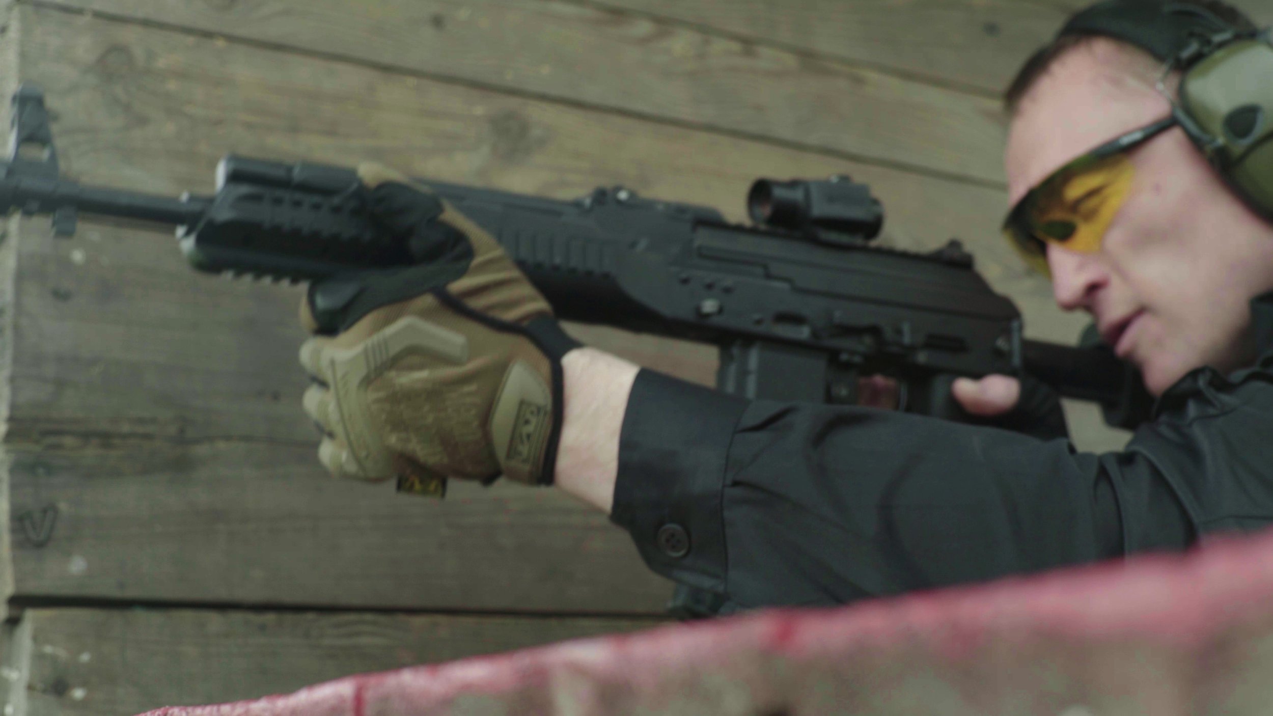 shooter-with-a-rifle-while-shooting-SBI-350075806.jpg