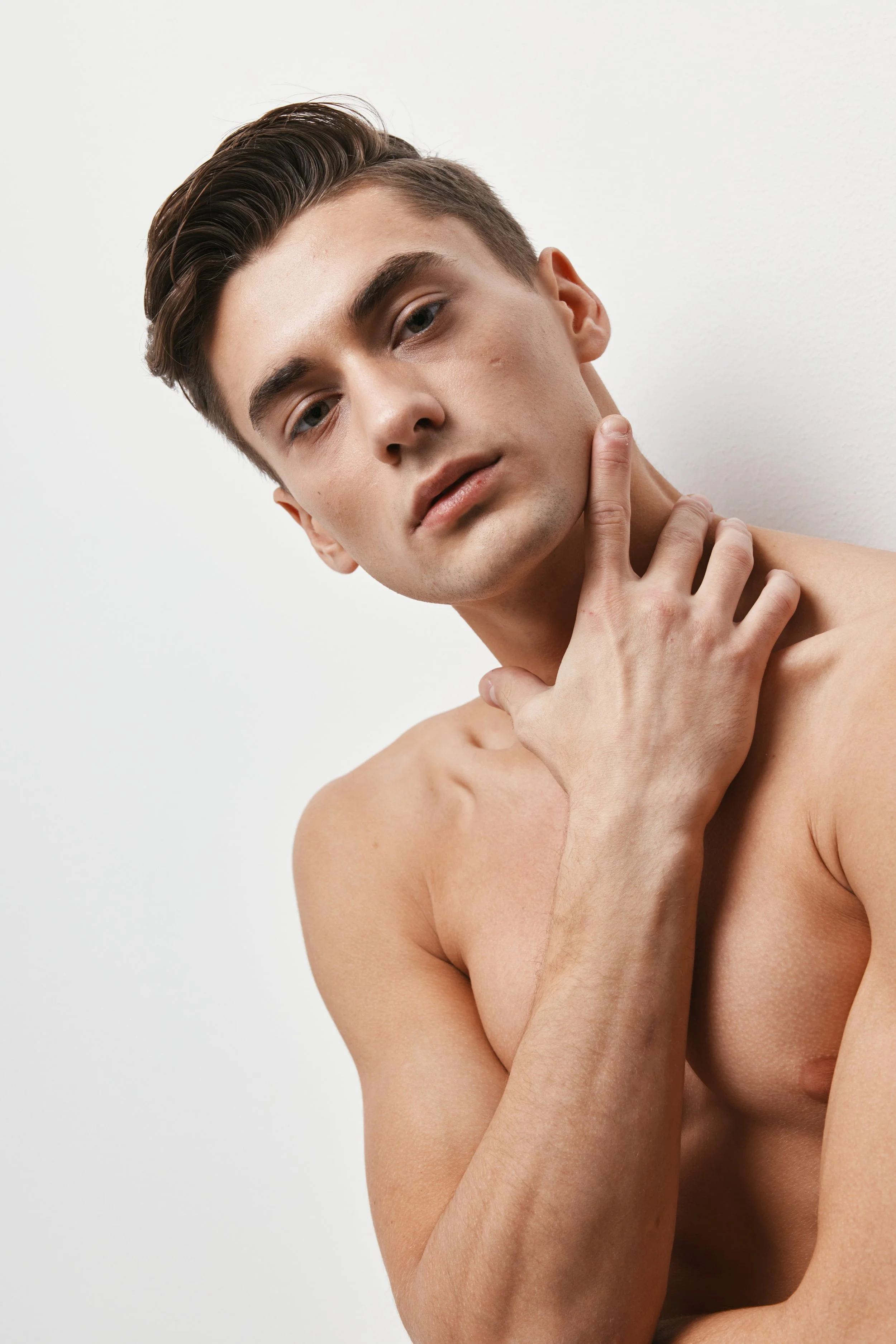 Male model with clear, healthy skin representing microneedling and PRP rejuvenation benefits.
